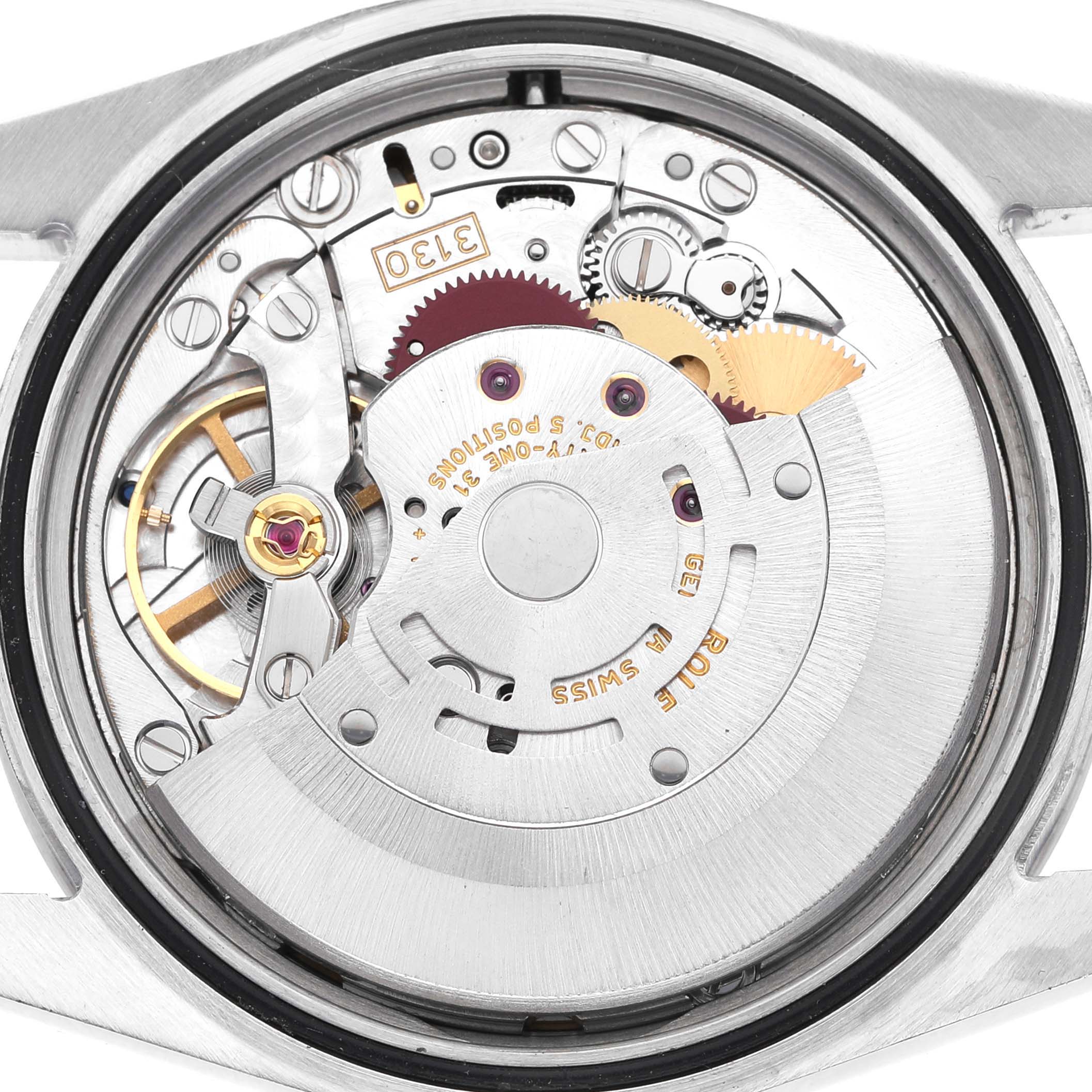 The image shows the movement from the back of a Rolex Explorer 114270 Men's Stainless Steel Black Dial, highlighting gears and components.