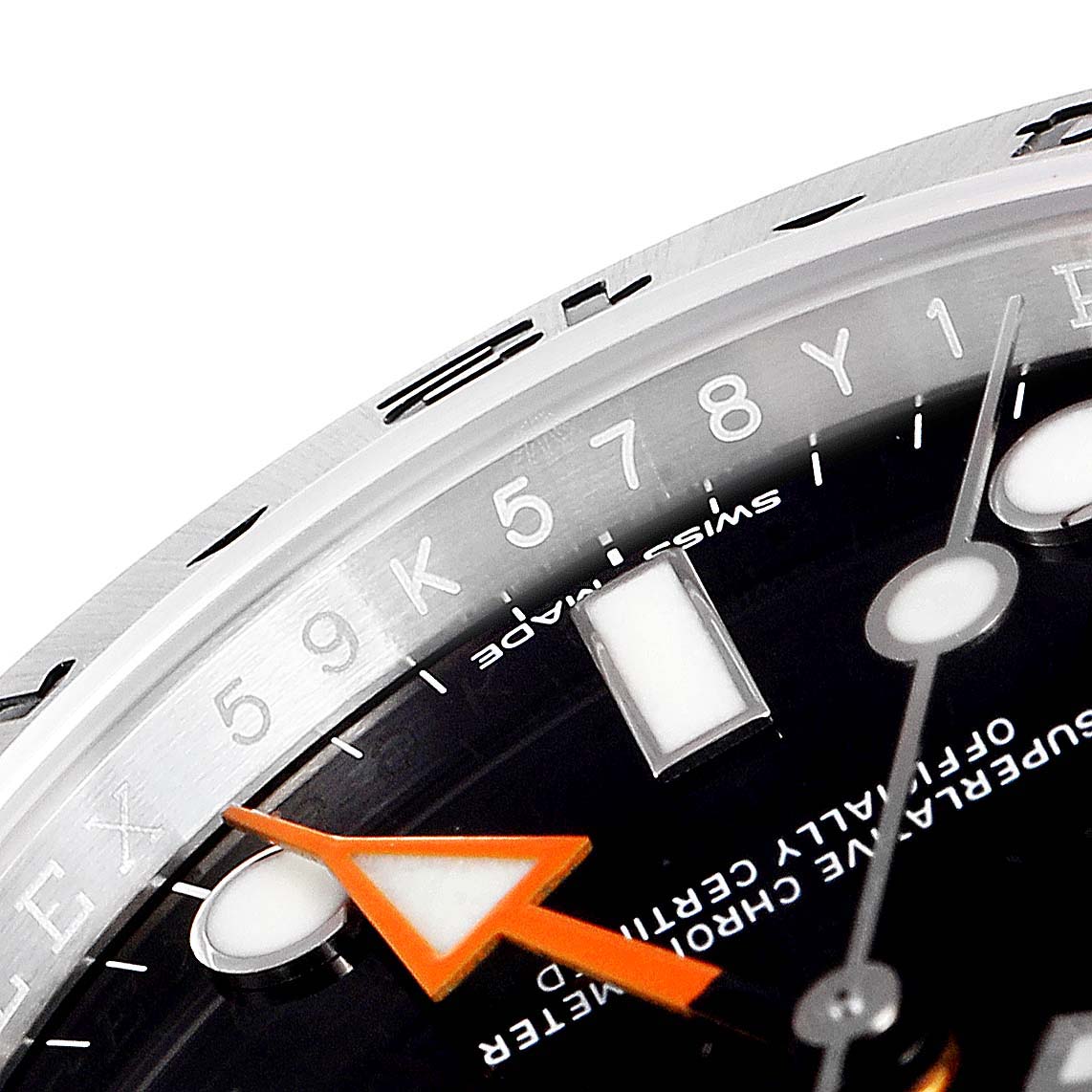 This close-up angle of the Rolex Explorer 216570 Men
s Stainless Steel Black Dial 216570 Men
s Stainless Steel Black Dial watch shows part of the dial, the hands, and part of the bezel with engraved numerals.