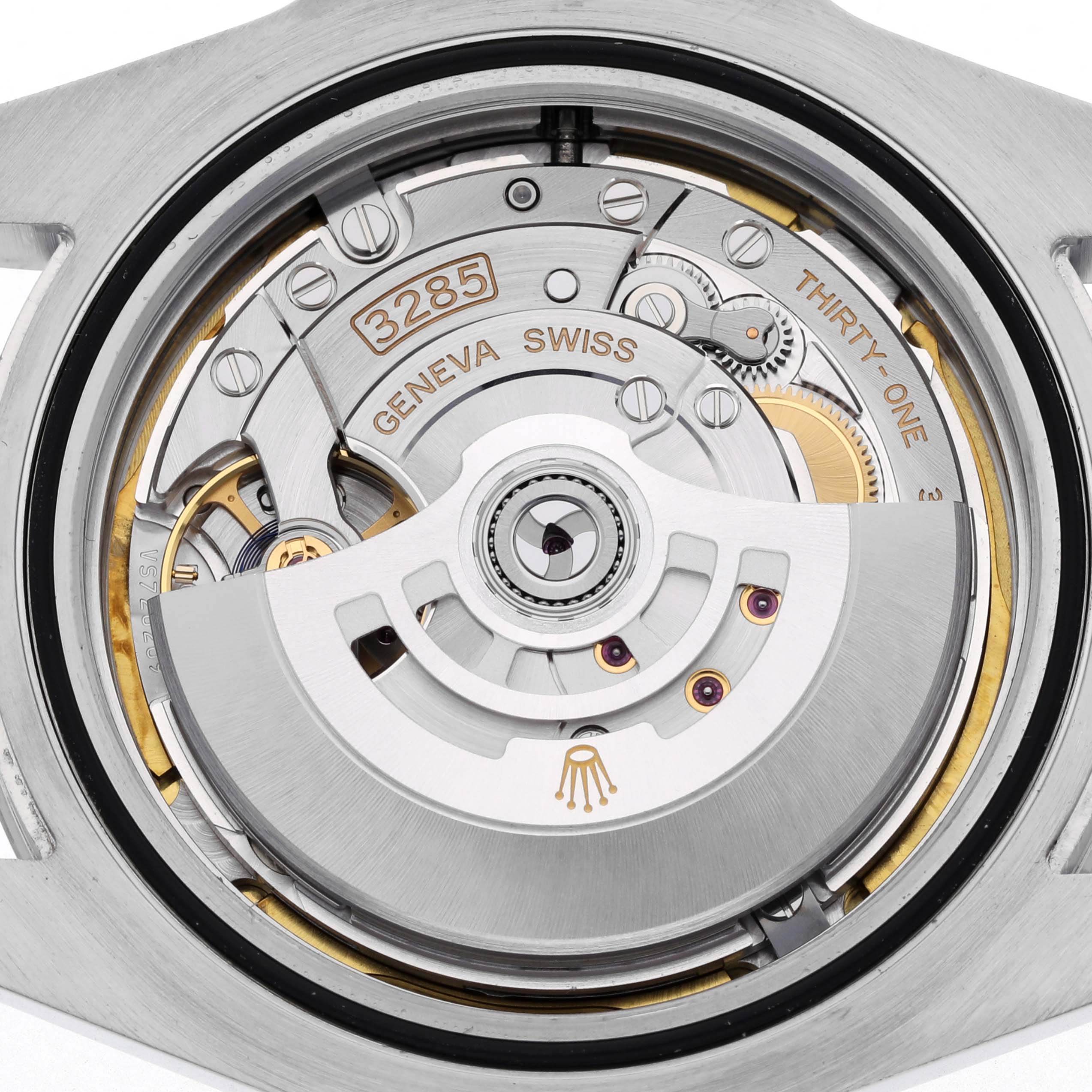 The image shows a close-up of the Rolex Explorer 226570 Men
s Stainless Steel Black Dial 226570 Men
s Stainless Steel Black Dial
s movement, featuring the automatic rotor and intricate gears.