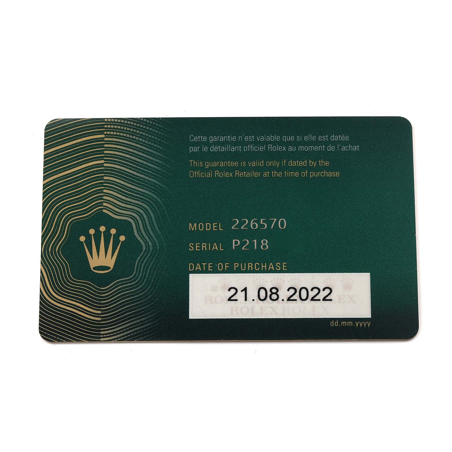 The image features a warranty card for the Rolex Explorer 226570 Men
s Stainless Steel Black Dial 226570 Men
s Stainless Steel Black Dial model 226570, showing model, serial number, and purchase date.