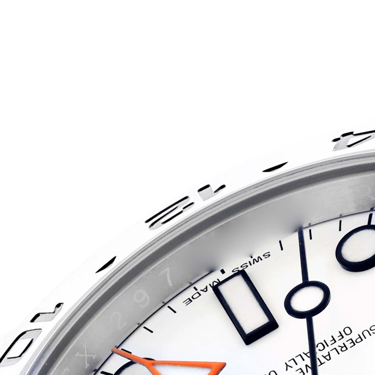 The image shows a close-up of the dial and bezel of a Rolex Explorer 216570 Men's Stainless Steel White Dial 216570 Men's Stainless Steel White Dial watch, highlighting the markers and part of the orange hand.