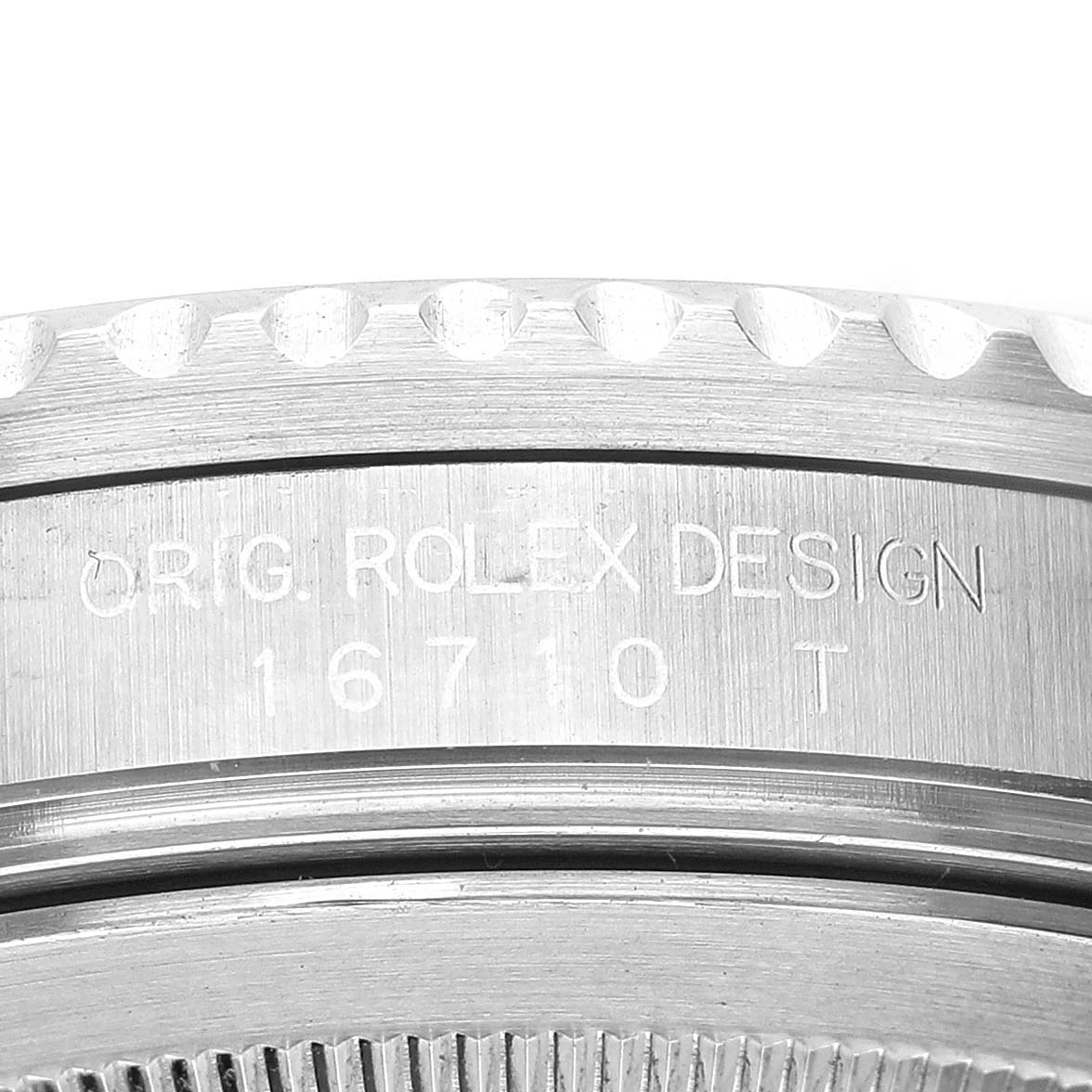 This image shows a close-up of the side engraving on the case of a Rolex GMT-Master 16710 Men's Stainless Steel Black Dial 16710 Men's Stainless Steel Black Dial model.