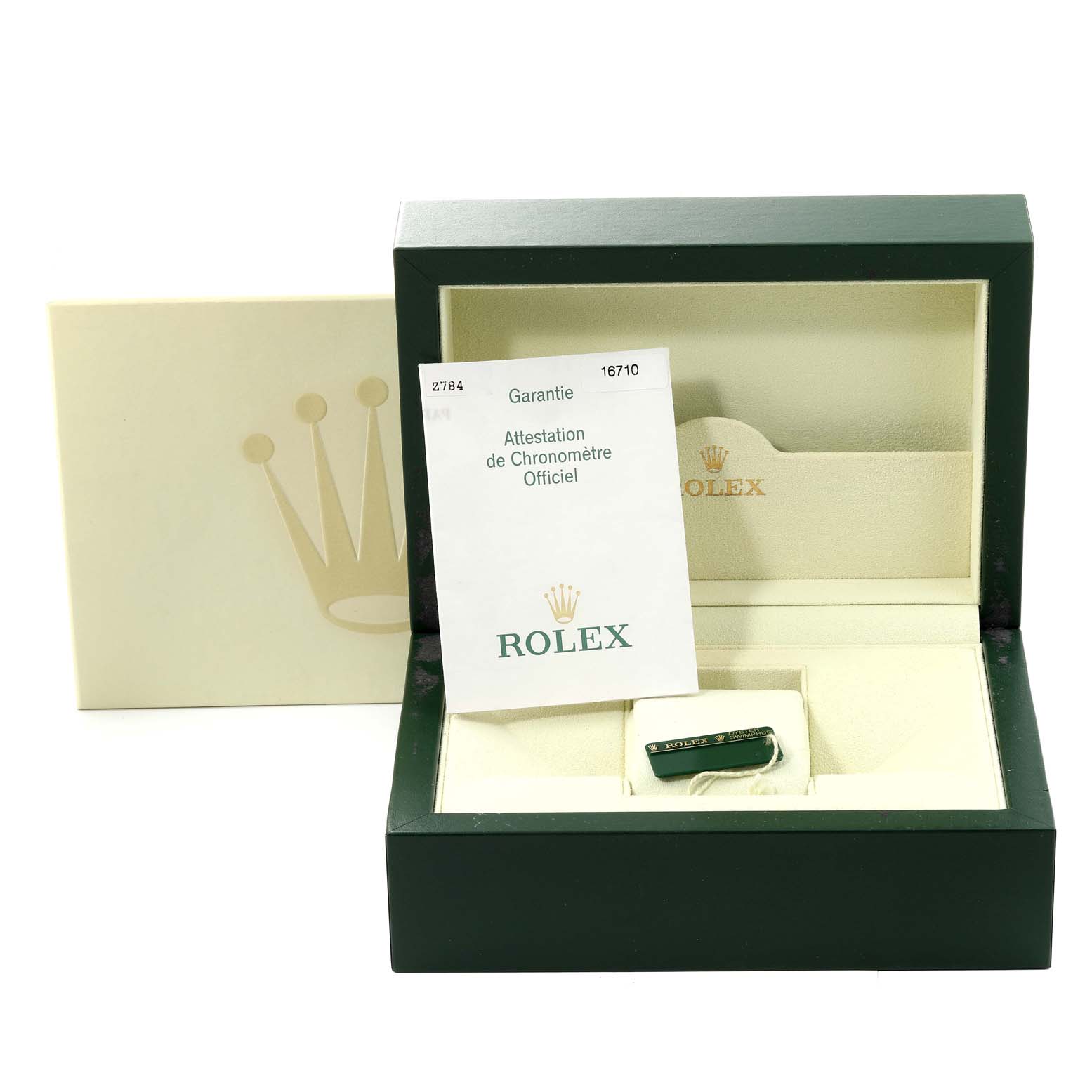 The image shows the packaging and paperwork of a Rolex GMT-Master 16710 Men's Stainless Steel Black Dial 16710 Men's Stainless Steel Black Dial watch, including a green box, booklet, and a tag.