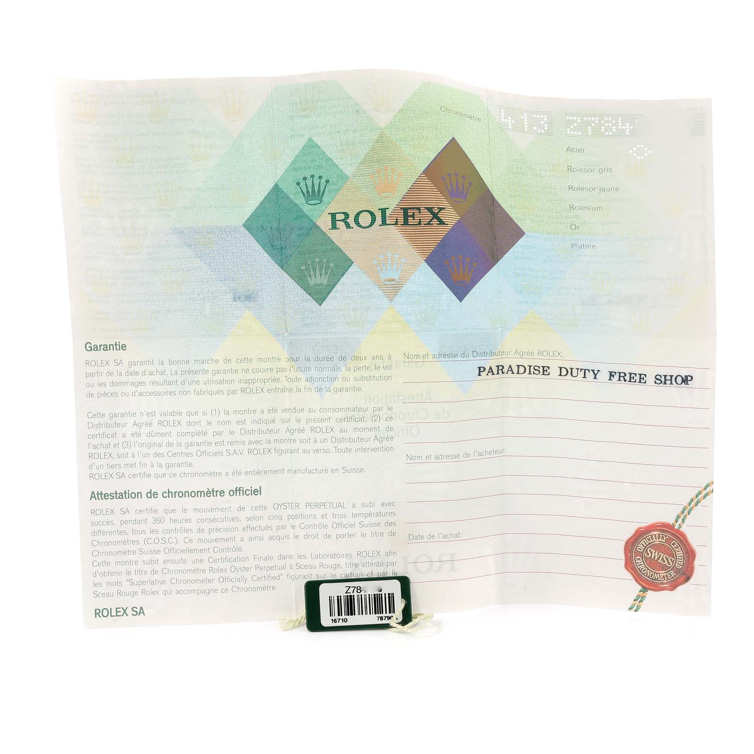 This image shows the warranty card for a Rolex GMT-Master 16710 Men's Stainless Steel Black Dial 16710 Men's Stainless Steel Black Dial watch from a Paradise Duty Free shop.