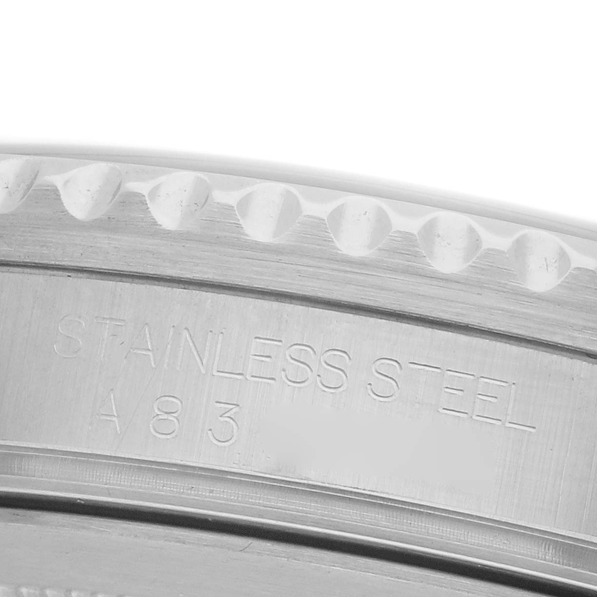 The image shows a close-up of the stainless steel case back of a Rolex GMT-Master 16710 Men's Stainless Steel Black Dial 16710 Men's Stainless Steel Black Dial watch.