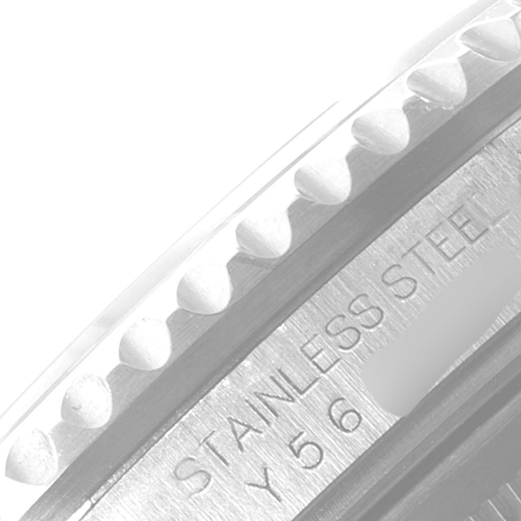 The image shows a close-up angle of the bezel and partial case, with "Stainless Steel" engraved, for a Rolex GMT-Master 16710 Men
s Stainless Steel Black Dial 16710 Men
s Stainless Steel Black Dial watch.