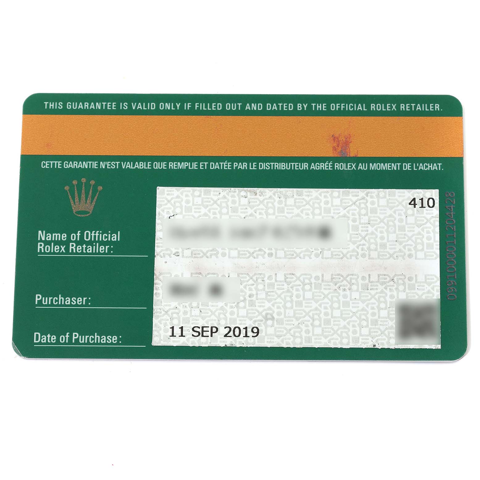 This image shows a Rolex warranty card for a GMT-Master model, with fields for the retailer, purchaser, and date of purchase.