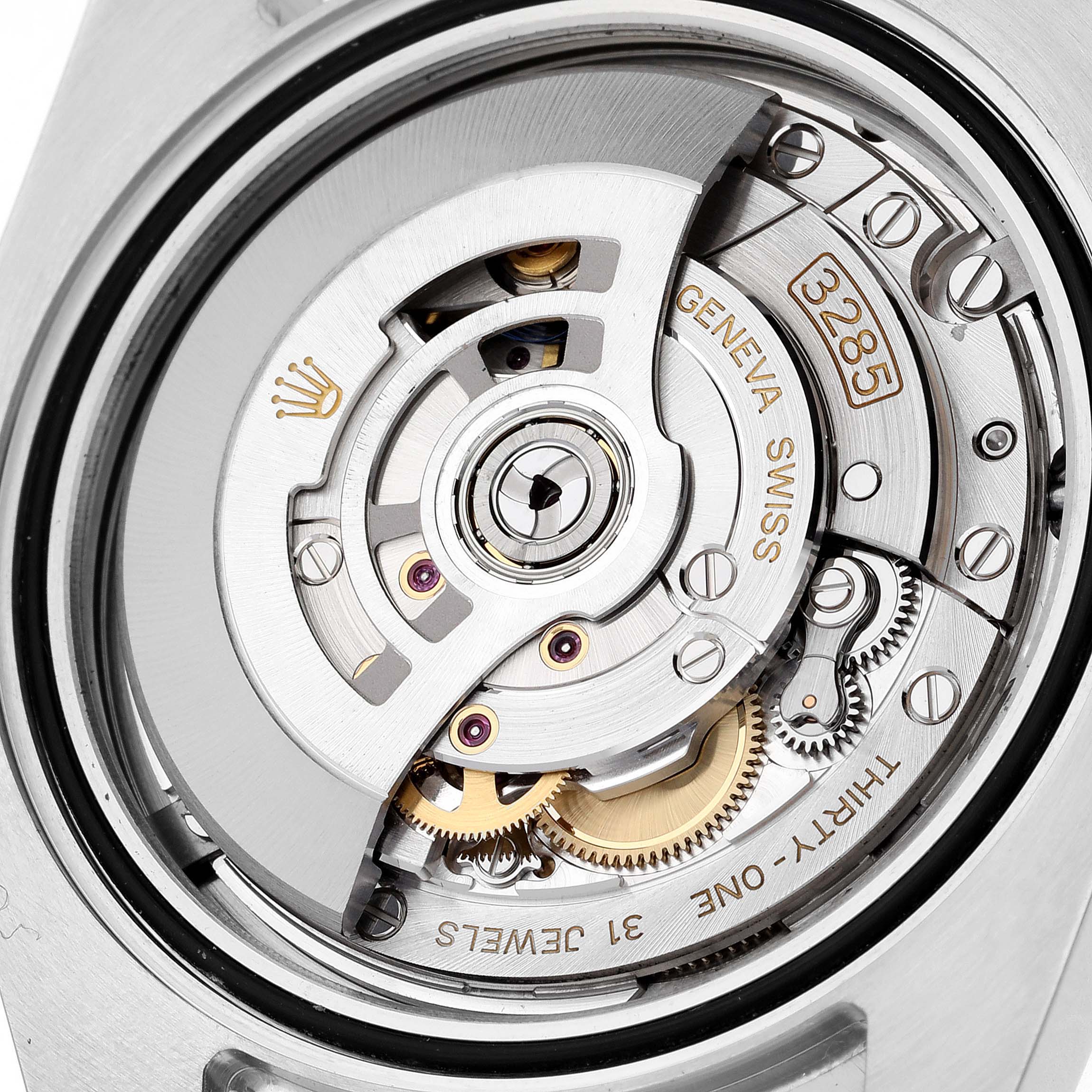 The image shows the intricate internal mechanism of the Rolex GMT-Master 126711CHNR Men's Steel and Gold (two tone) Black Dial 126711CHNR Men's Steel and Gold (two tone) Black Dial, highlighting the rotor and gears.