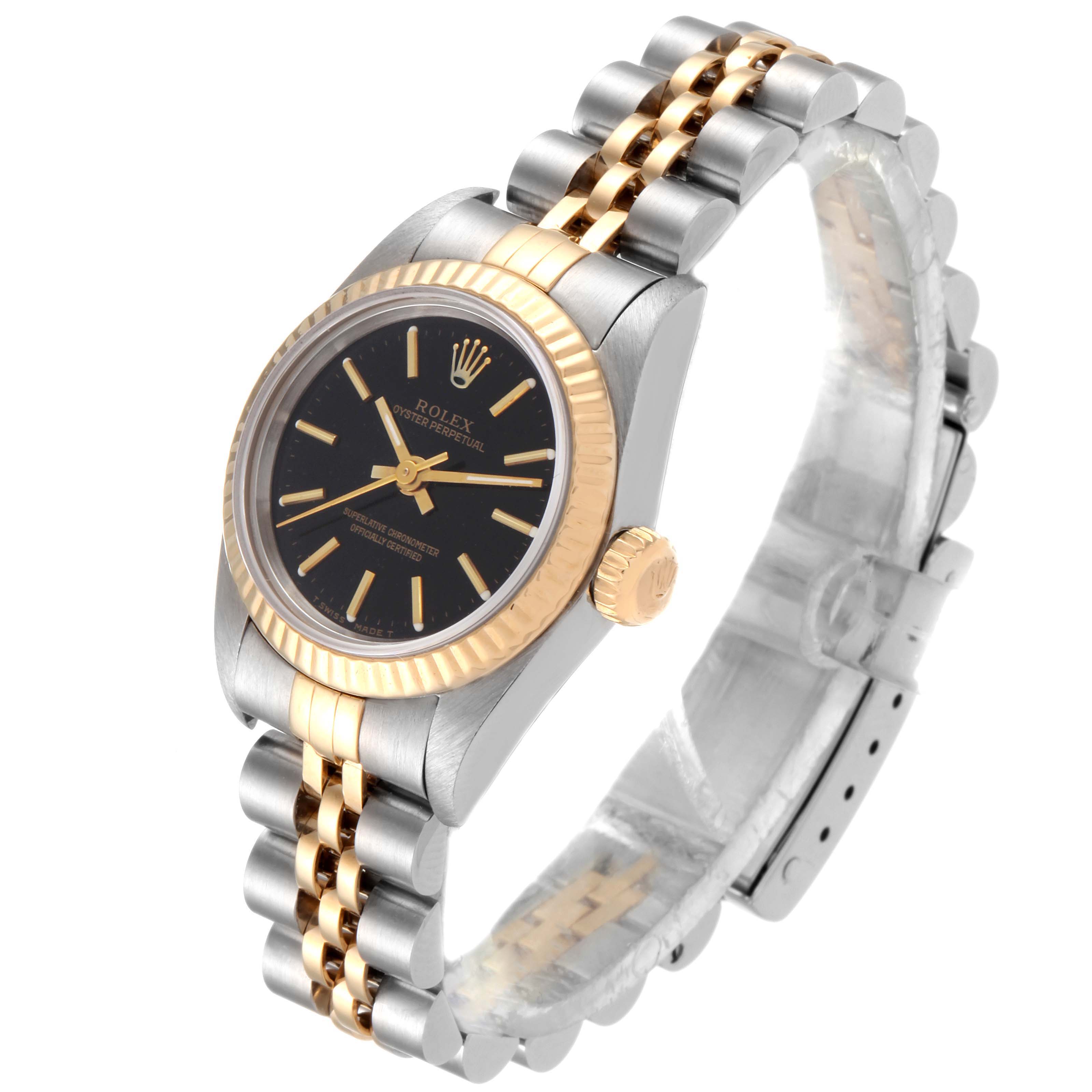 The Oyster Perpetual Rolex watch is shown at an angled view, displaying the face, bezel, crown, and bracelet.