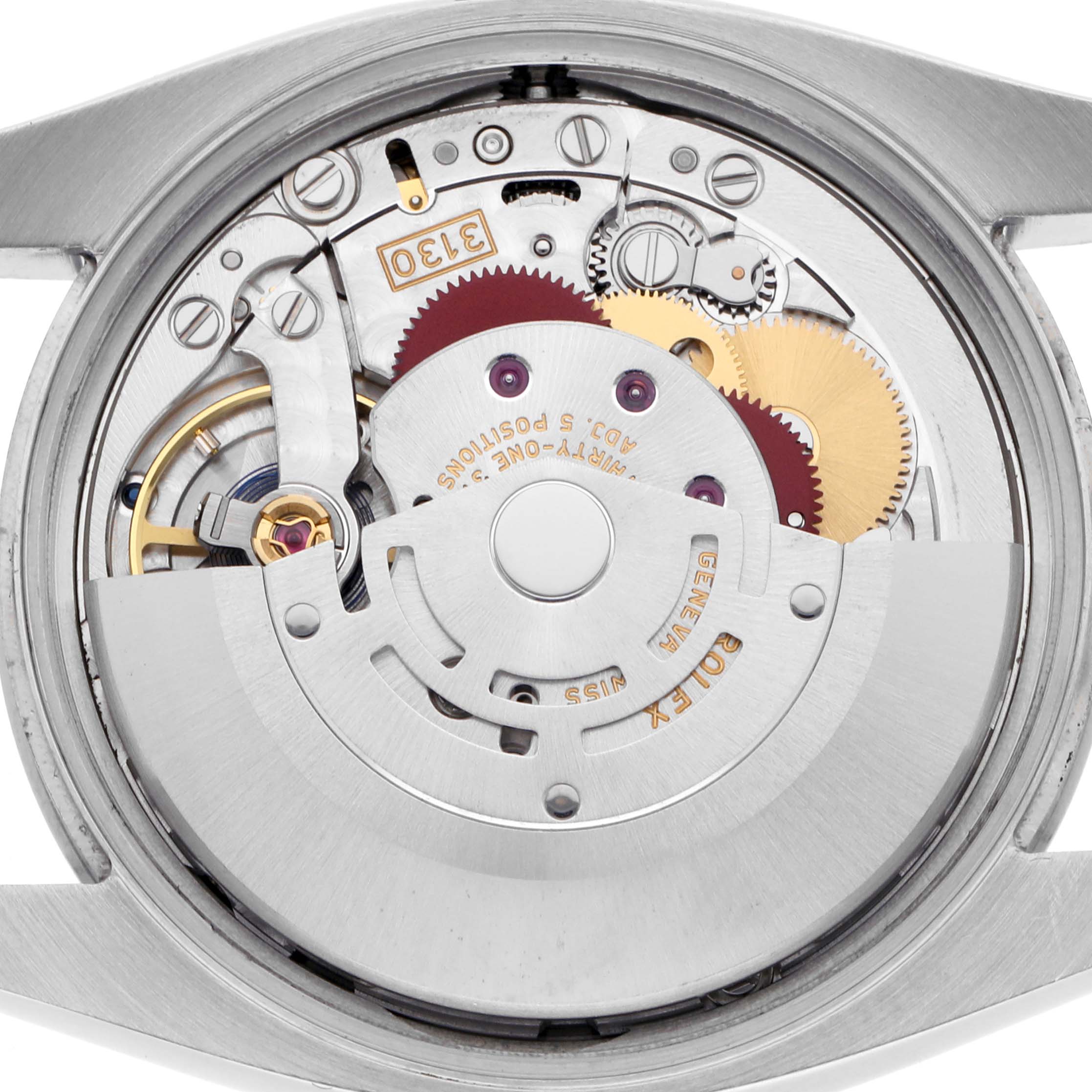 The image shows the internal mechanism of a Rolex Oyster Perpetual 114200 Men's Stainless Steel Green Dial 114200 Men's Stainless Steel Green Dial watch from a top-down angle.