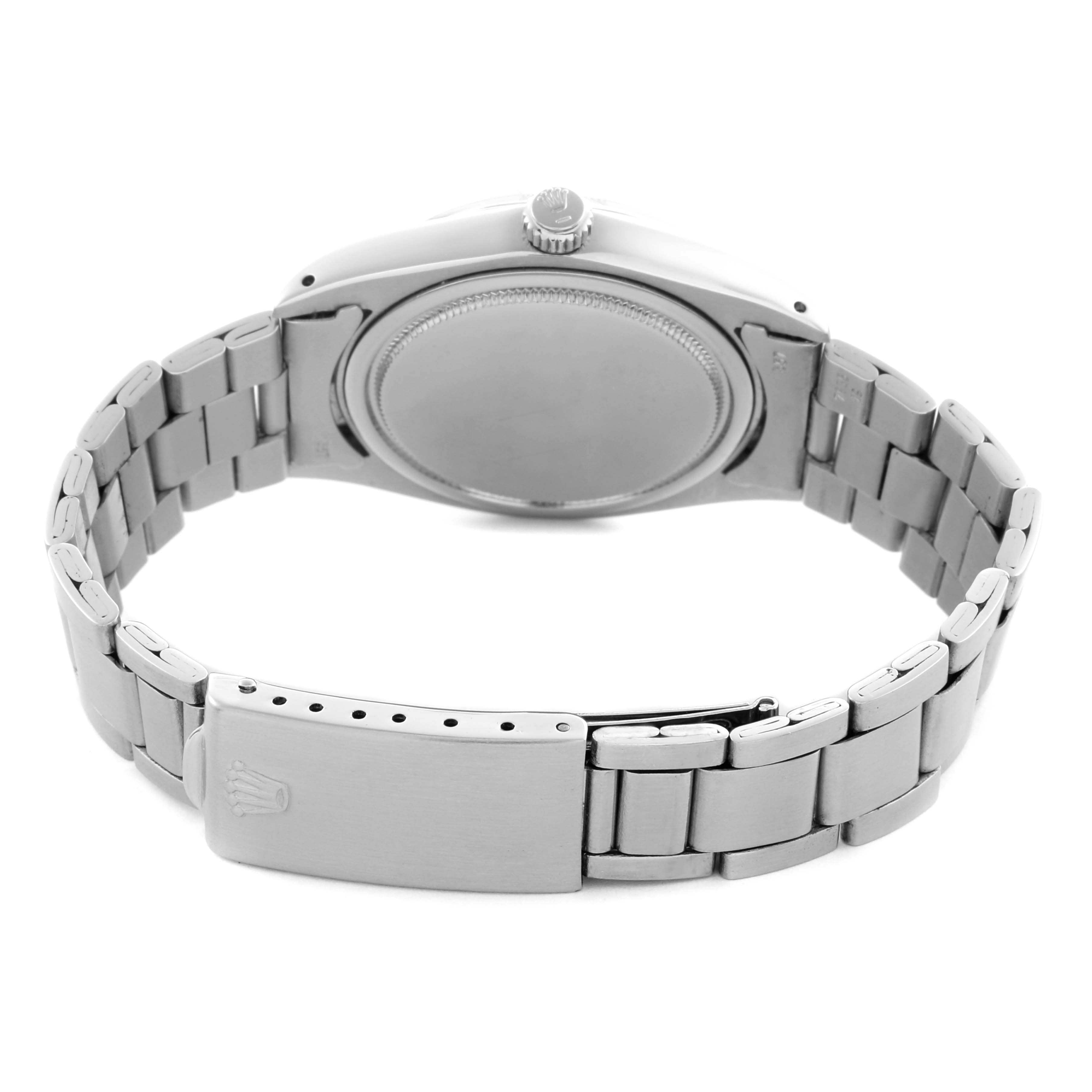 The image shows the back case and bracelet of a Rolex Date 6694 Men's Stainless Steel Silver Dial 6694 Men's Stainless Steel Silver Dial watch, focused on the closed clasp and link details.