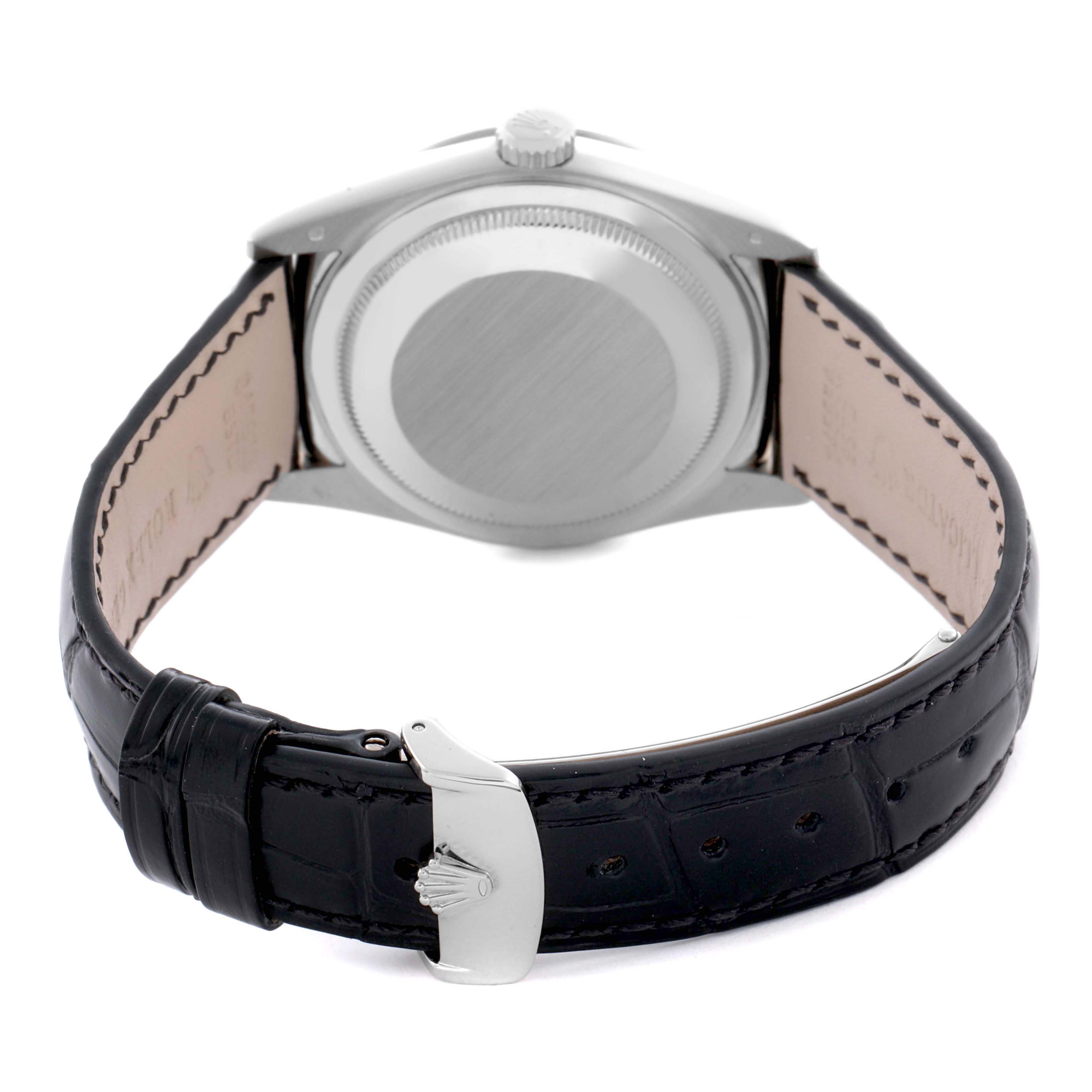 The image shows the back of a Rolex President 118139 Men's White Gold Mother of Pearl Dial model with a leather strap and clasp.