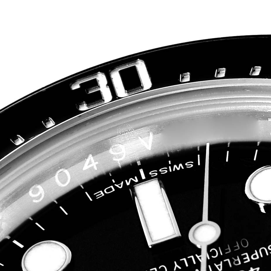 The image shows a close-up of the dial and bezel, specifically the 30-minute marker, of a Rolex Sea-Dweller 116600 Men's Stainless Steel Black Dial 116600 Men's Stainless Steel Black Dial watch.