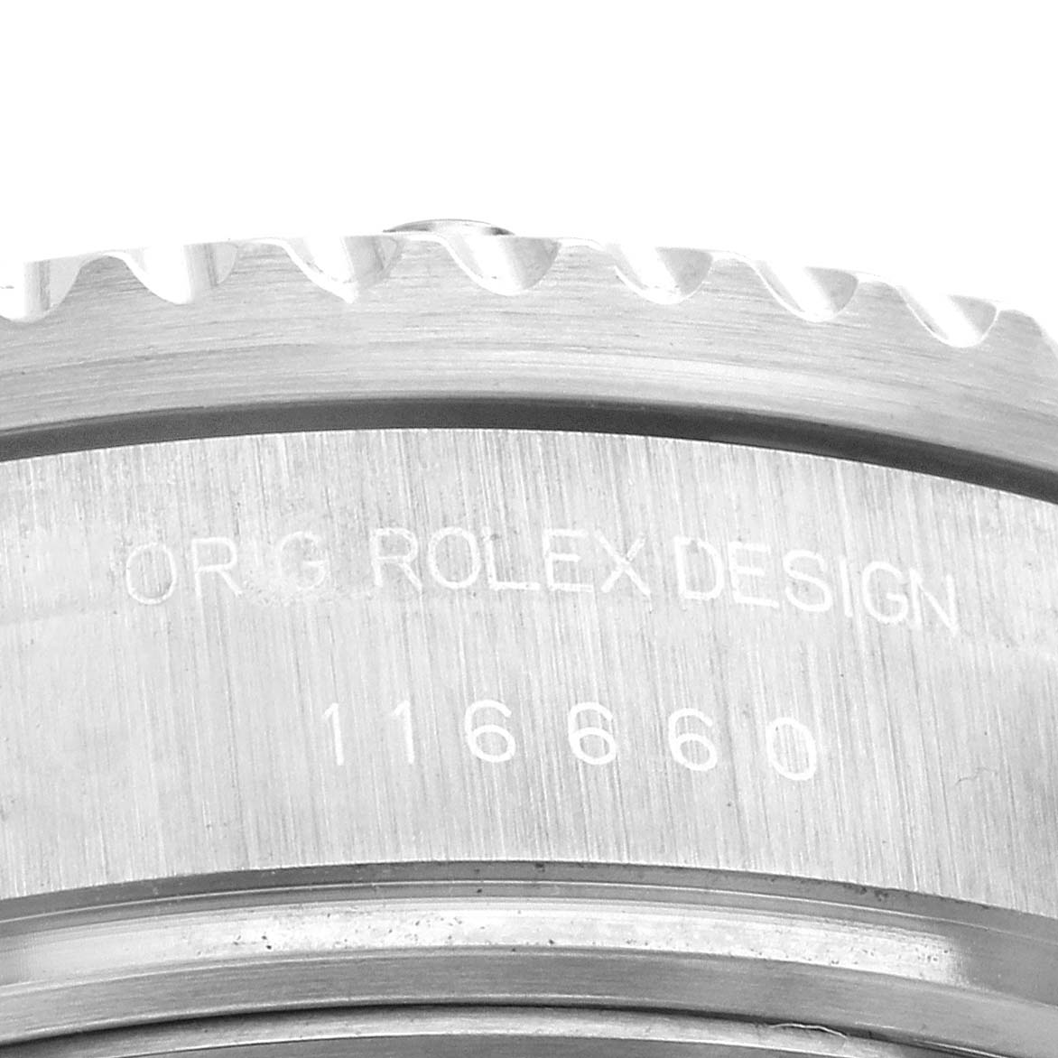 The image shows a close-up of the engraved side of a Rolex Sea-Dweller 116660 Men's Stainless Steel Black Dial 116660 Men's Stainless Steel Black Dial's bezel.