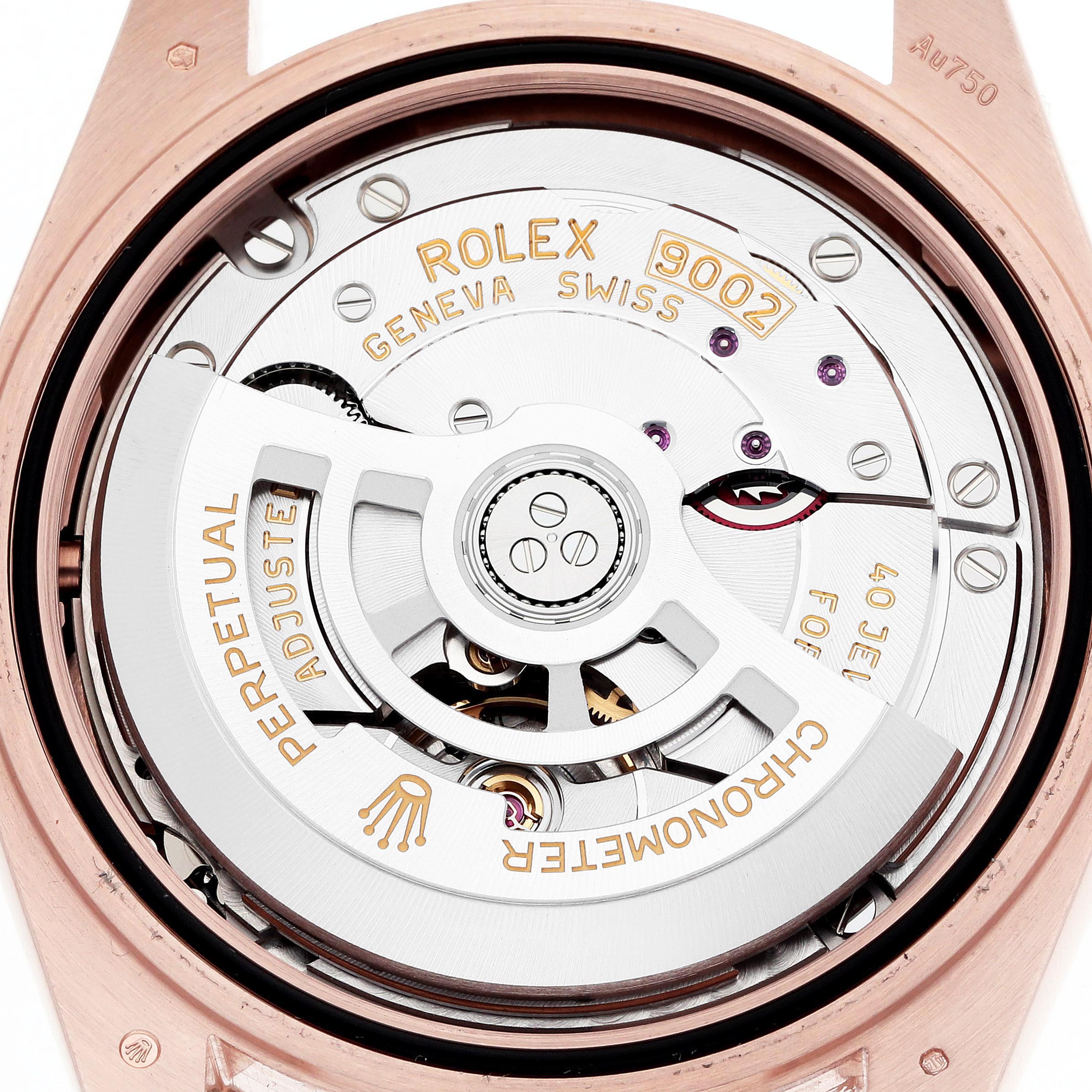 The image shows the movement of a Rolex Sky-Dweller 336935 Men's Rose Gold Grey Dial watch from the back, highlighting the rotor and various engravings.
