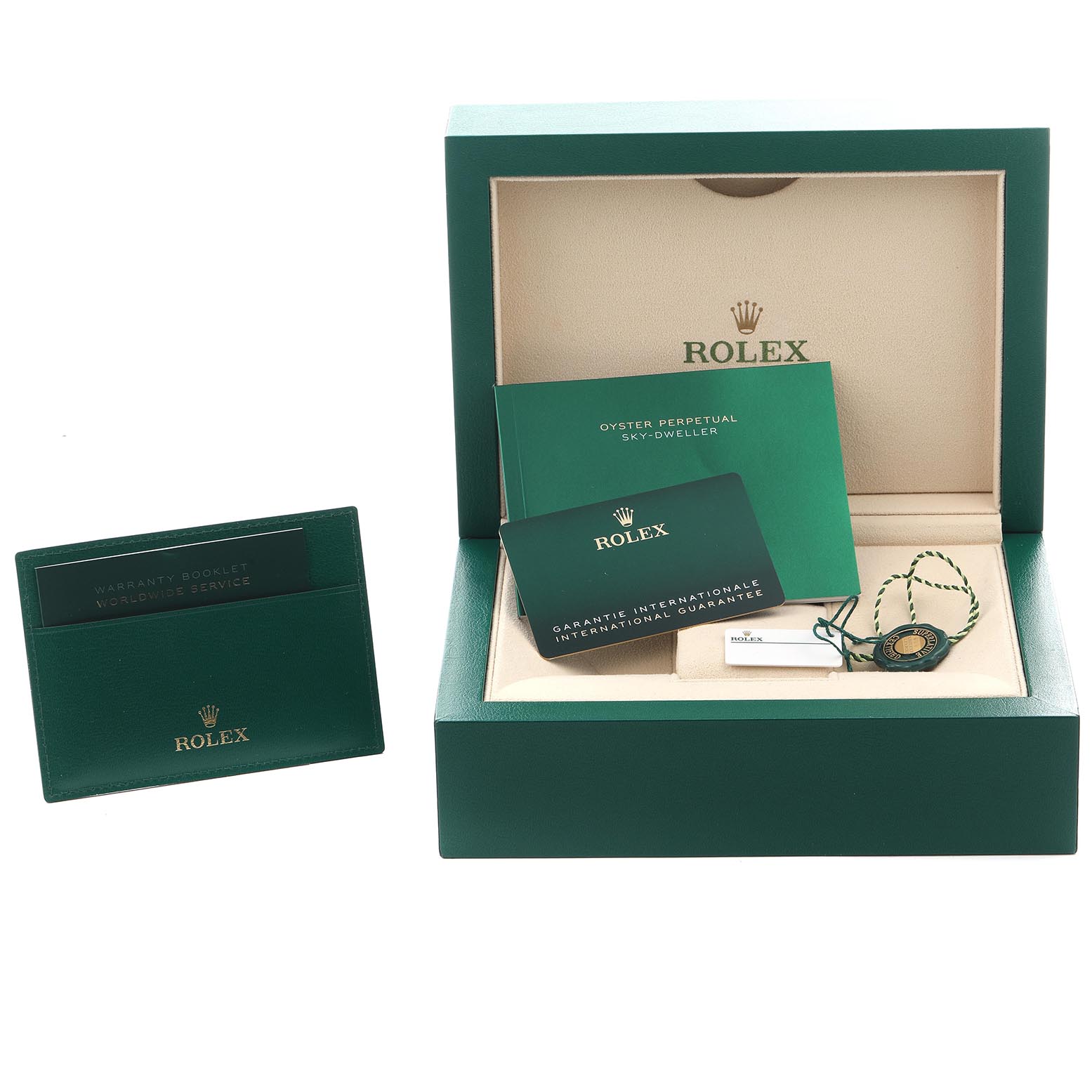 The image shows a Rolex Sky-Dweller 326935 Men's Rose Gold Grey Dial 326935 Men's Rose Gold Grey Dial box, warranty cards, booklets, and a tag, viewed from the front.