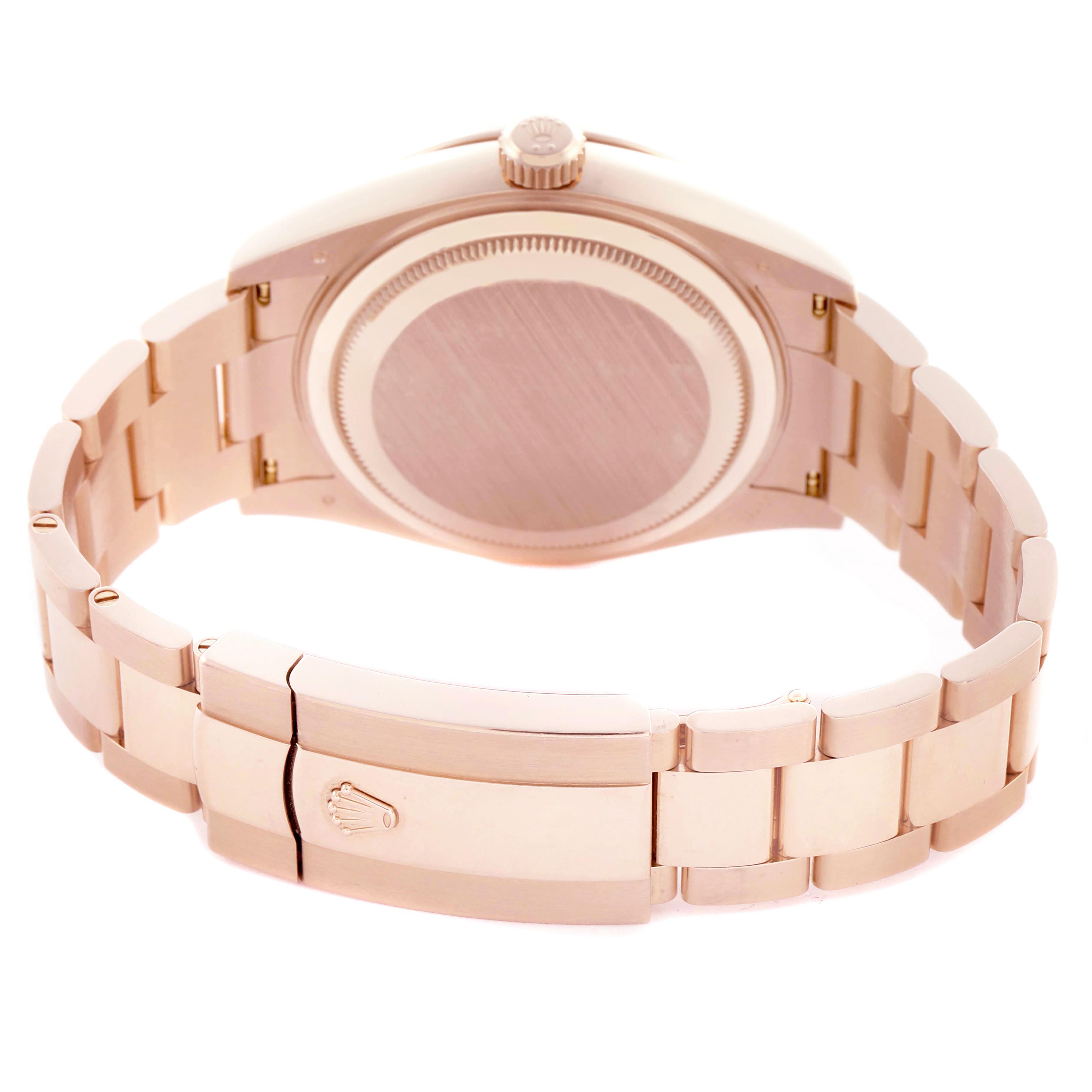 The image shows the back view of a Rolex Sky-Dweller 336935 Men's Rose Gold Grey Dial, highlighting the case back, bracelet, and clasp.