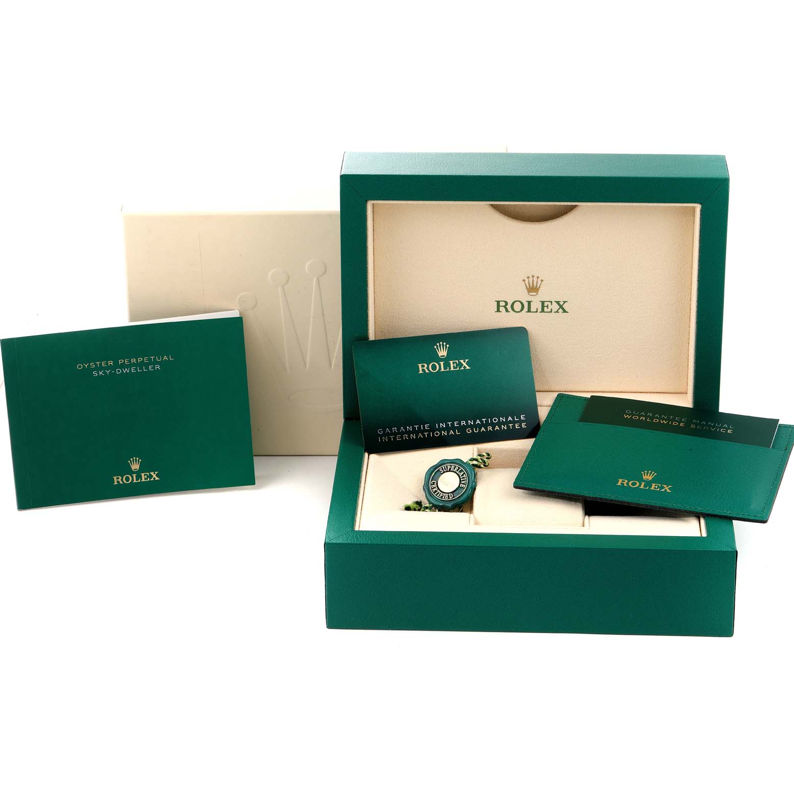 This image shows the packaging and accessories for the Rolex Sky-Dweller 326933 Men's Steel and Gold (two tone) Black Dial 326933 Men's Steel and Gold (two tone) Black Dial, including manuals, warranty cards, and a box.