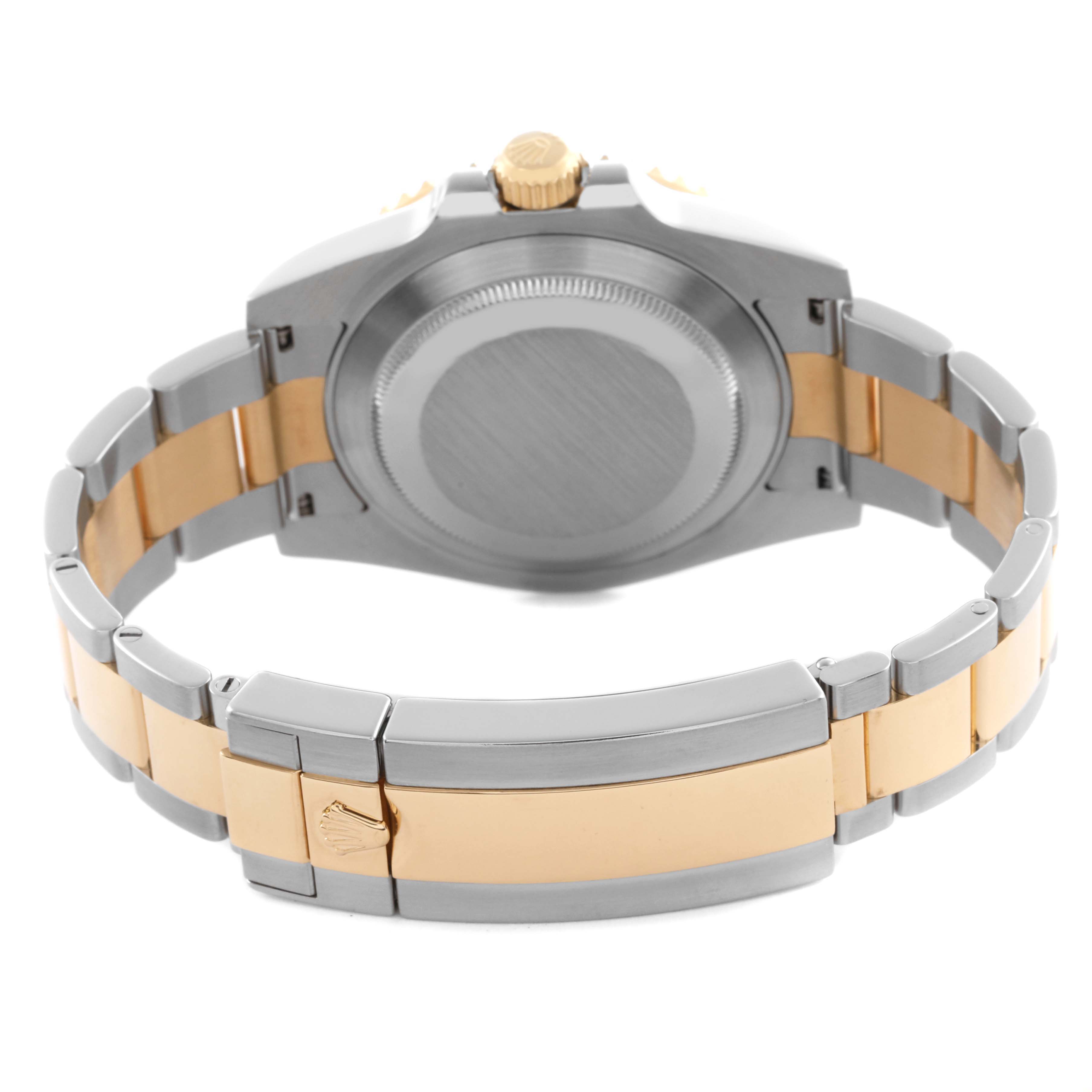 The image shows the back of a Rolex Submariner 116613LB Men's Steel and Gold (two tone) Blue Dial 116613LB Men's Steel and Gold (two tone) Blue Dial, highlighting the case back, crown, and two-tone bracelet with a clasp.