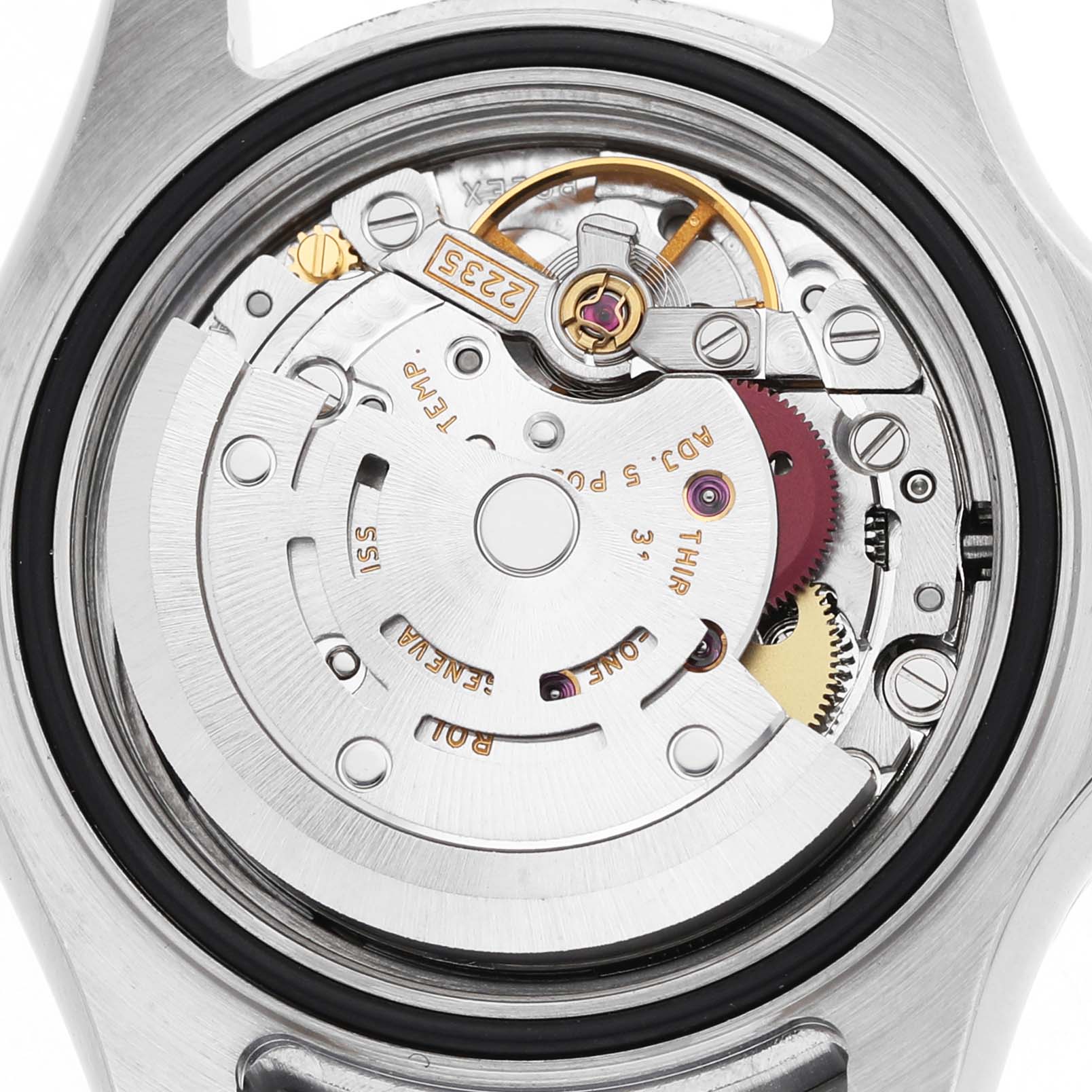The image shows the internal movement of the Rolex Yacht-Master 169622 Women's Stainless Steel Silver Dial watch viewed from the back, highlighting gears and mechanical components.