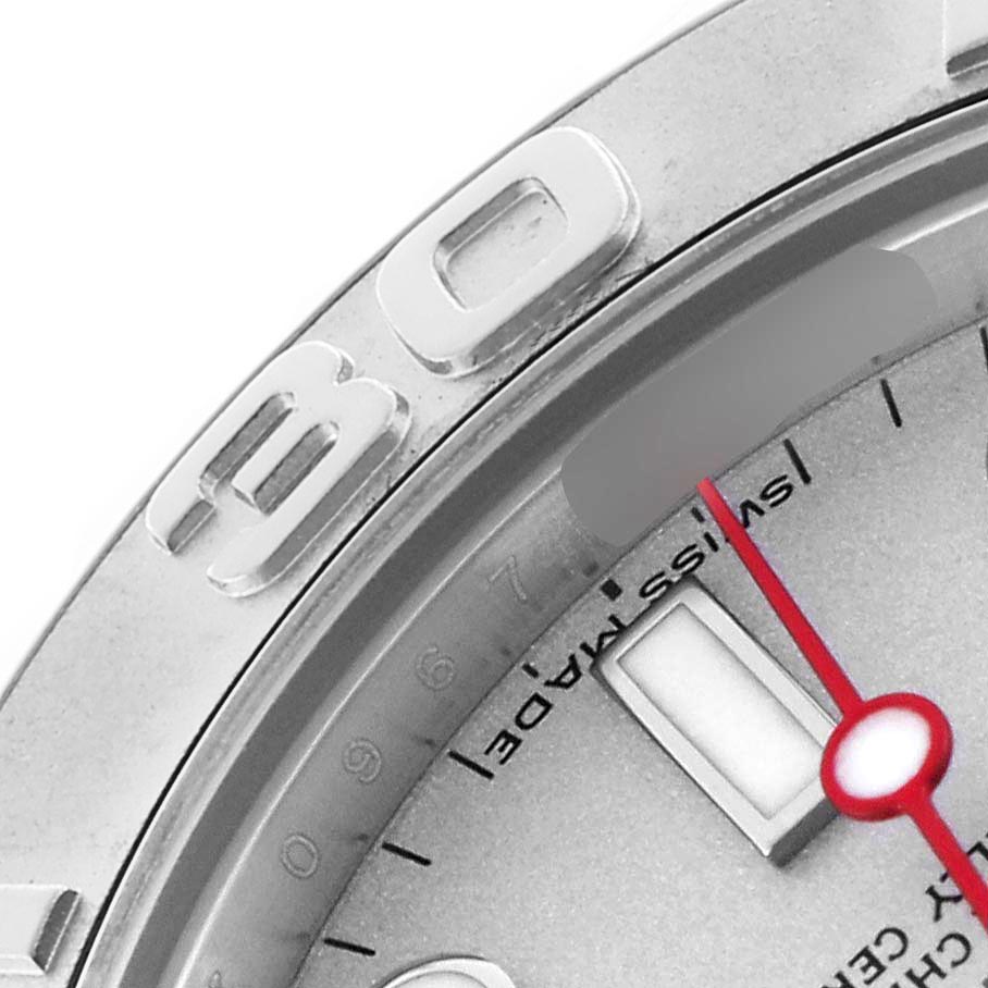 The image shows a close-up of the Rolex Yacht-Master 168622 Men
s Stainless Steel Silver Dial 168622 Men
s Stainless Steel Silver Dial
s bezel, partial dial, and part of the minute and hour markers.