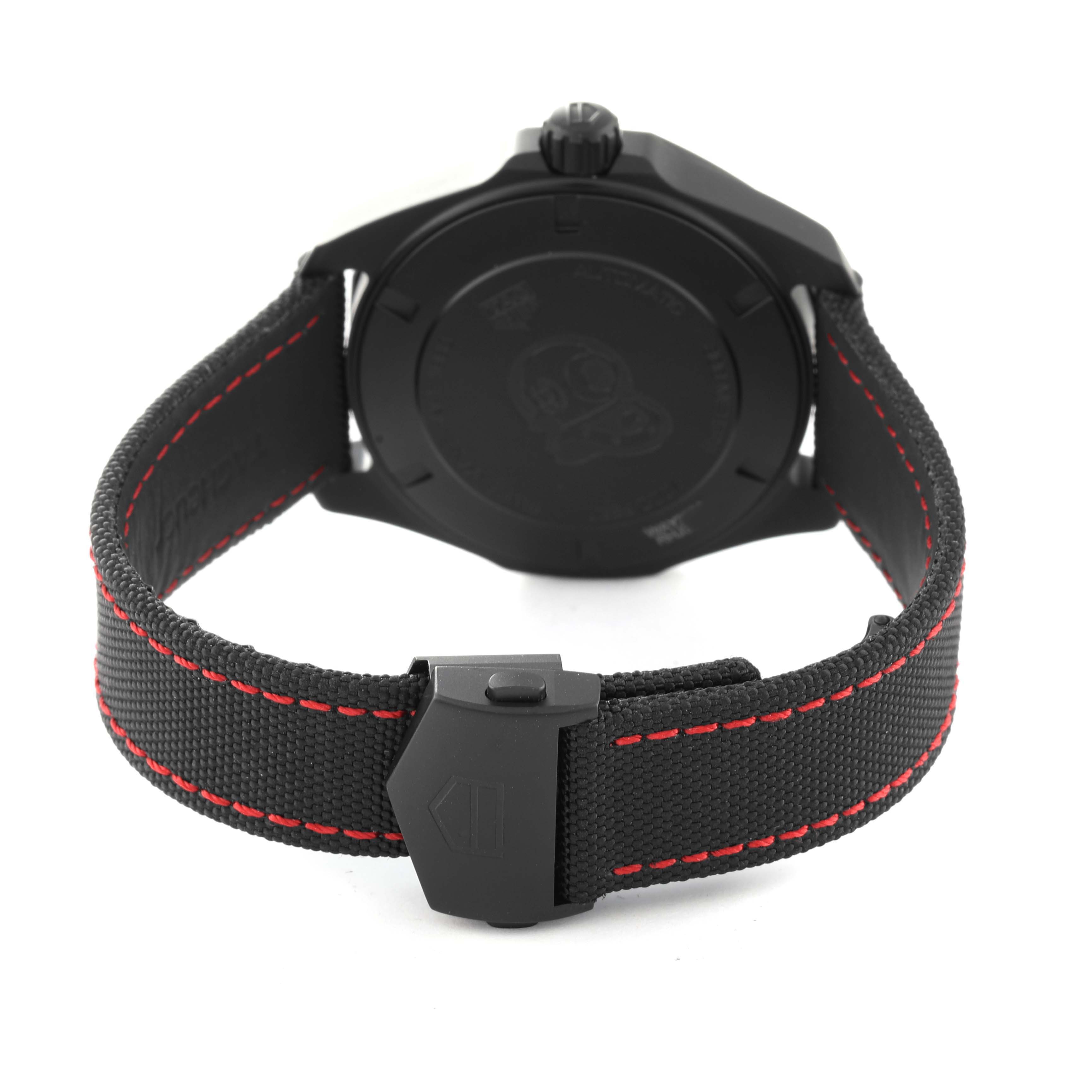 The image shows the back view of a Tag Heuer Aquaracer WAY208A.FC6381 Men's Titanium Black Dial WAY208A.FC6381 Men's Titanium Black Dial watch, highlighting its strap with red stitching and buckle.