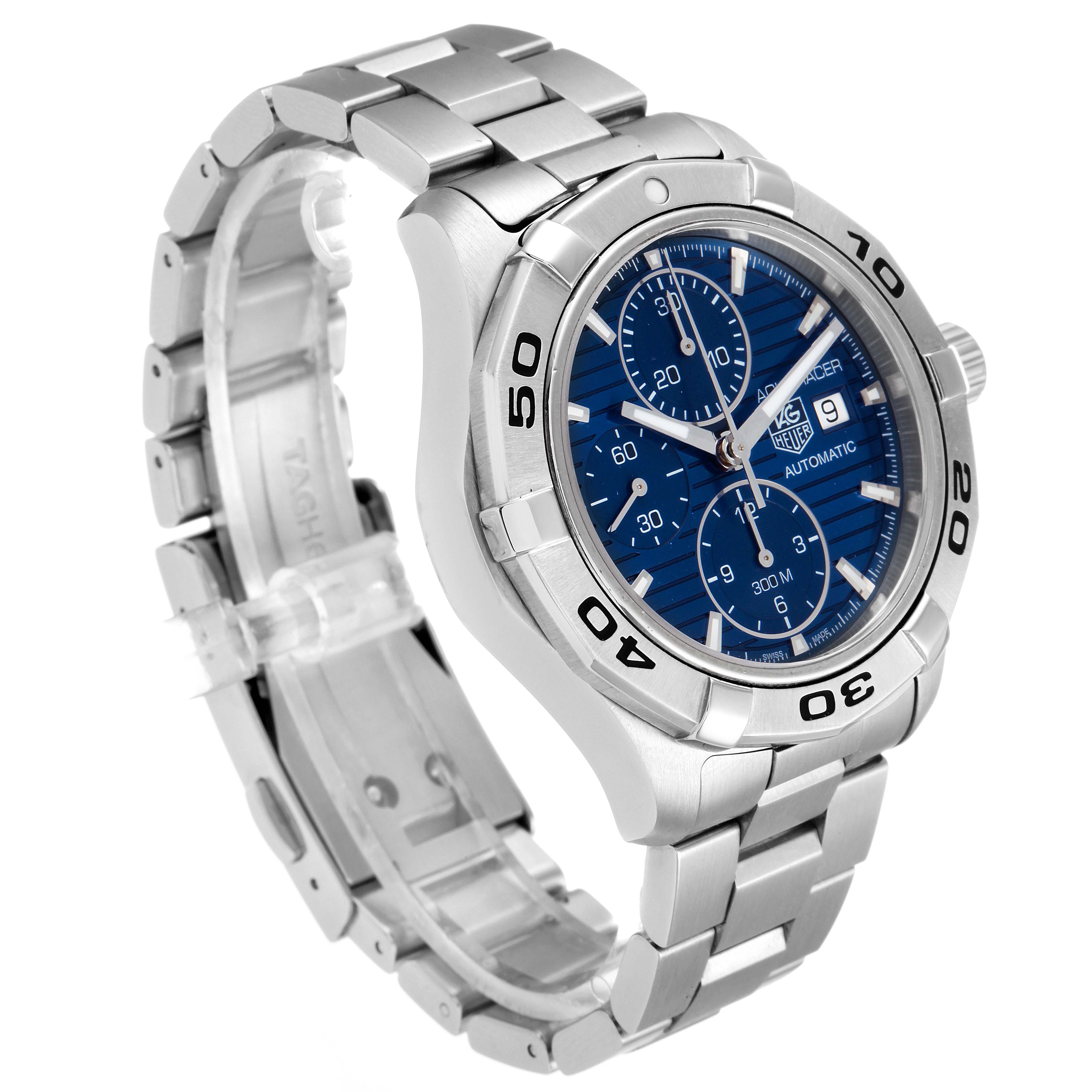 The image shows a three-quarter view of the Tag Heuer Aquaracer CAP2112.BA0833 Men
s Stainless Steel Blue Dial CAP2112.BA0833 Men
s Stainless Steel Blue Dial watch, highlighting its blue dial, bezel, and metal bracelet.