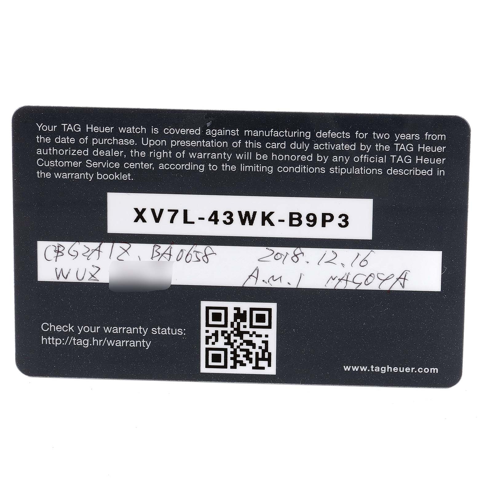 This is a warranty card for the Tag Heuer Carrera CBG2A1Z.BA0658 Men
s Stainless Steel Black Dial CBG2A1Z.BA0658 Men
s Stainless Steel Black Dial model, showing text details, codes, and a QR code.