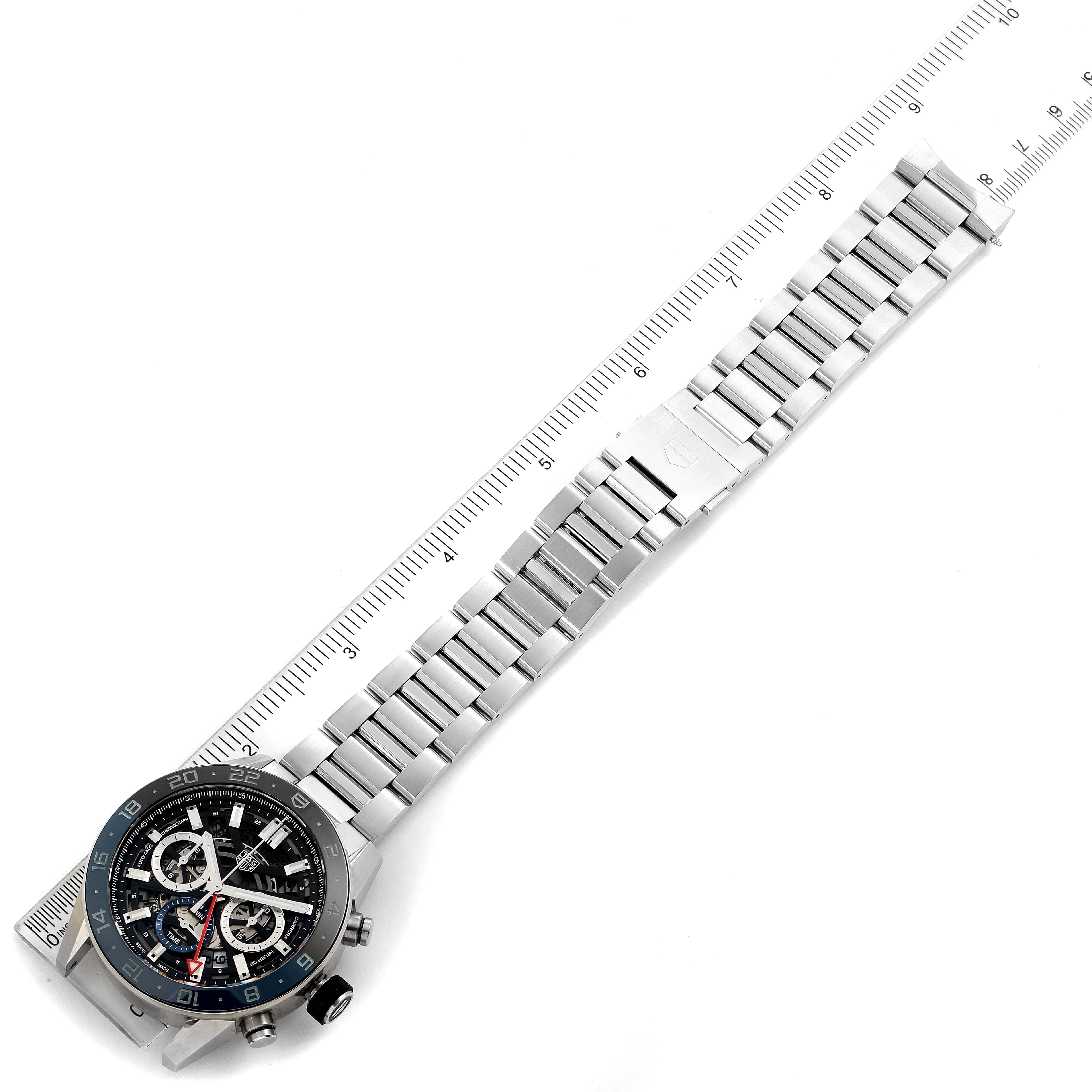 The Tag Heuer Carrera CBG2A1Z.BA0658 Men
s Stainless Steel Black Dial CBG2A1Z.BA0658 Men
s Stainless Steel Black Dial watch is shown from above, displaying its face, stainless steel bracelet, and clasp.