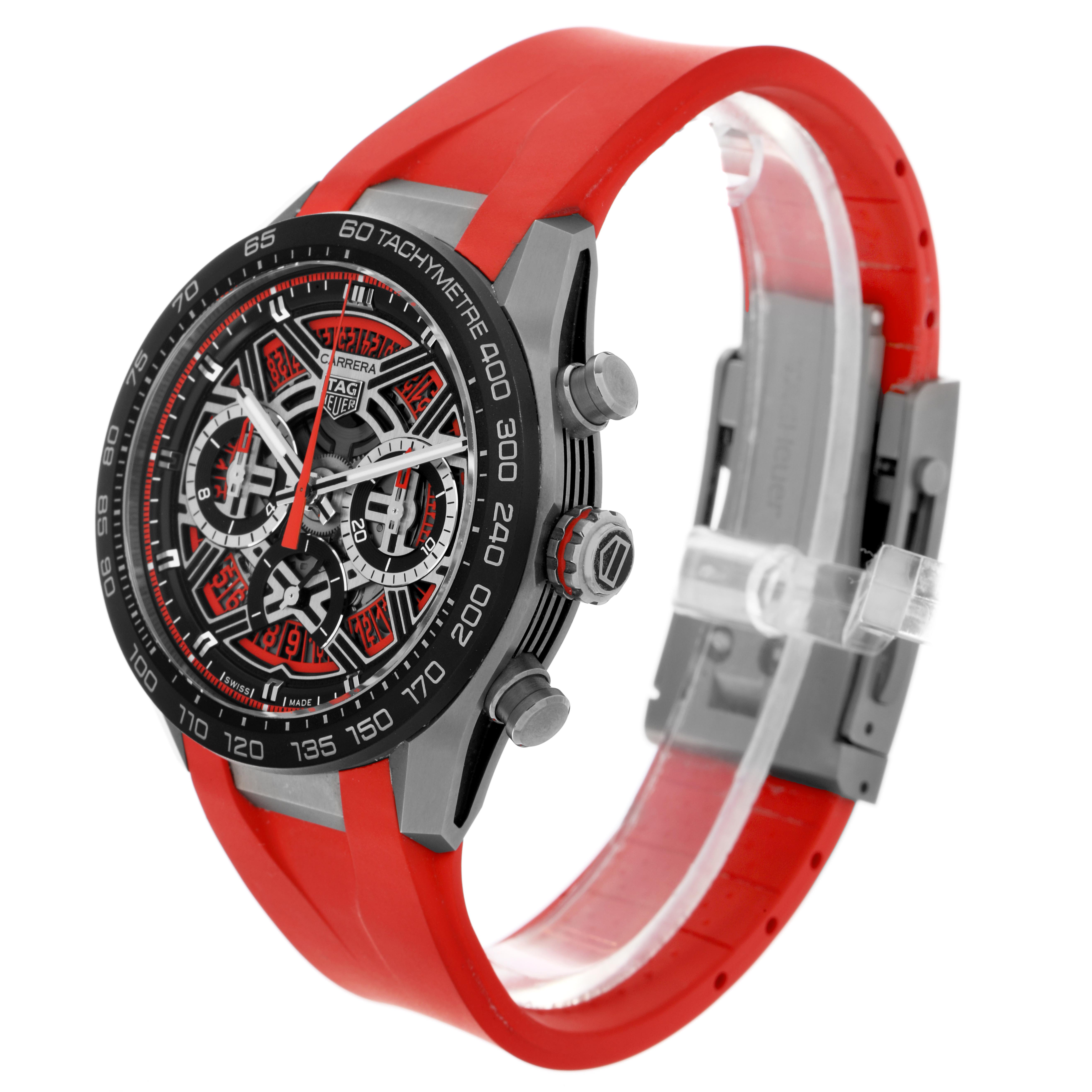 The Tag Heuer Carrera CBU2082 Men
s Titanium Red Dial CBU2082 Men
s Titanium Red Dial watch is shown at a three-quarter angle, highlighting the face, bezel, crown, and red strap.