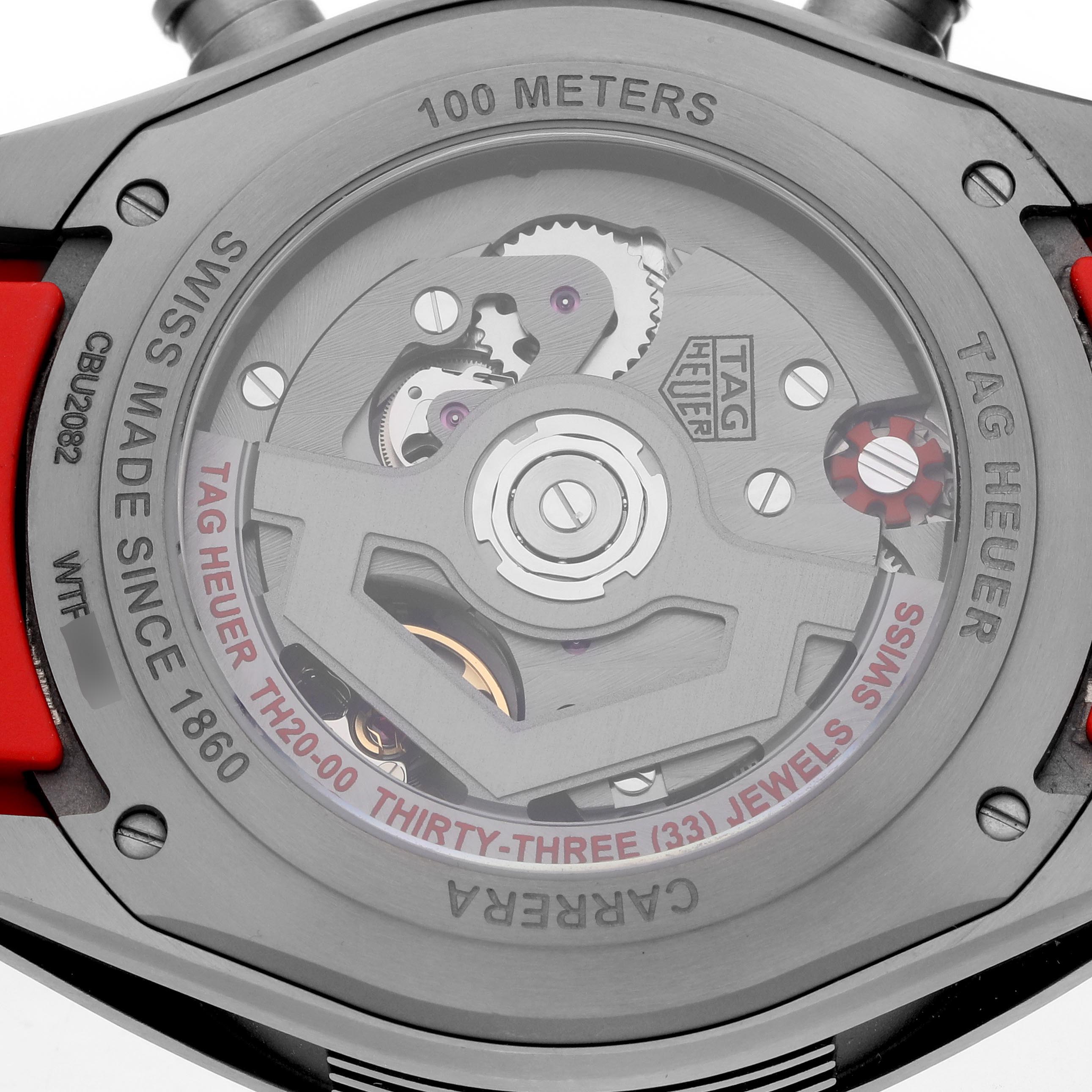 The image shows the back of the Tag Heuer Carrera CBU2082 Men
s Titanium Red Dial CBU2082 Men
s Titanium Red Dial watch, highlighting its internal mechanics and rotor.