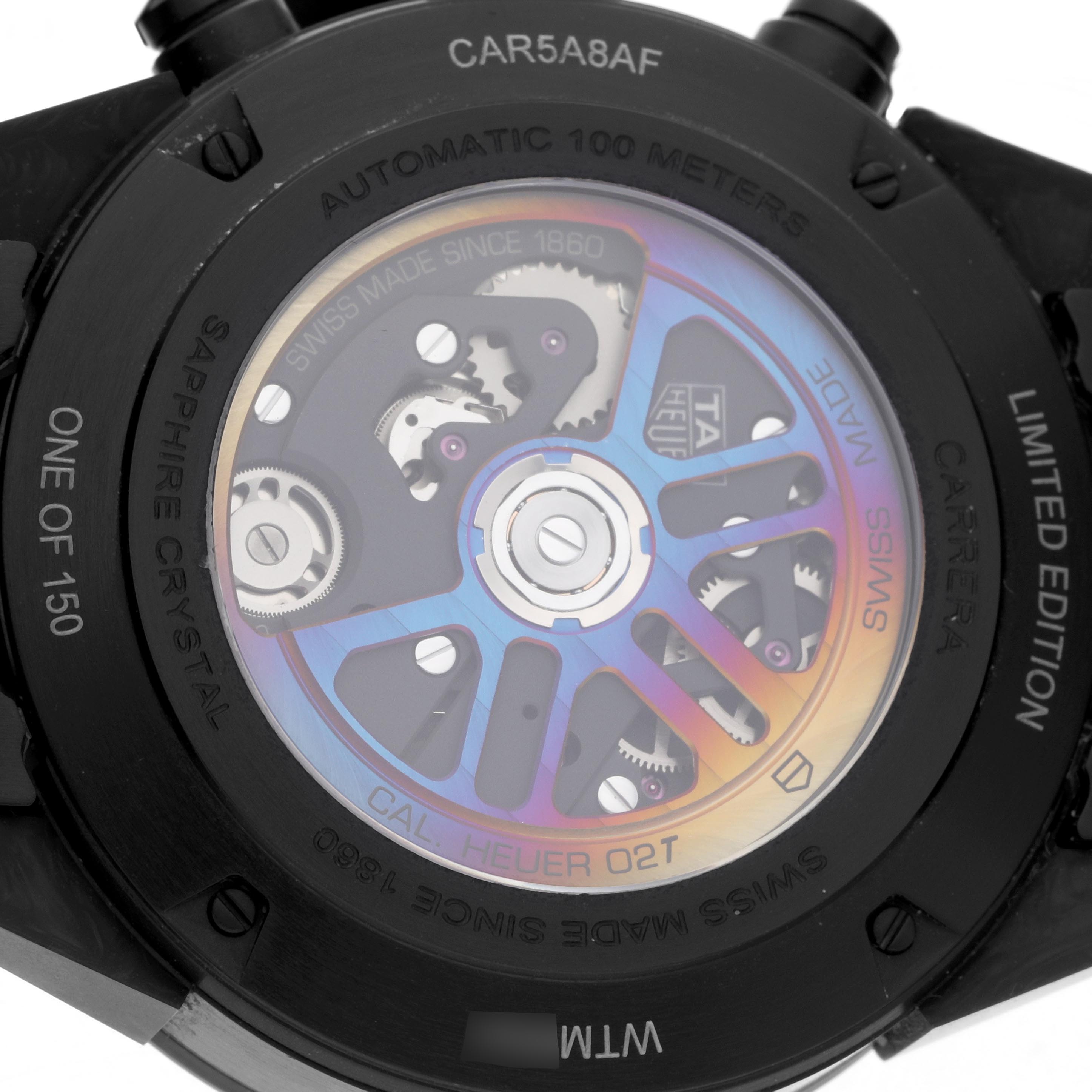 The image shows the back of a Tag Heuer Carrera CAR5A8AF Men's Titanium Black Dial CAR5A8AF Men's Titanium Black Dial watch, highlighting the automatic movement and sapphire crystal case back.