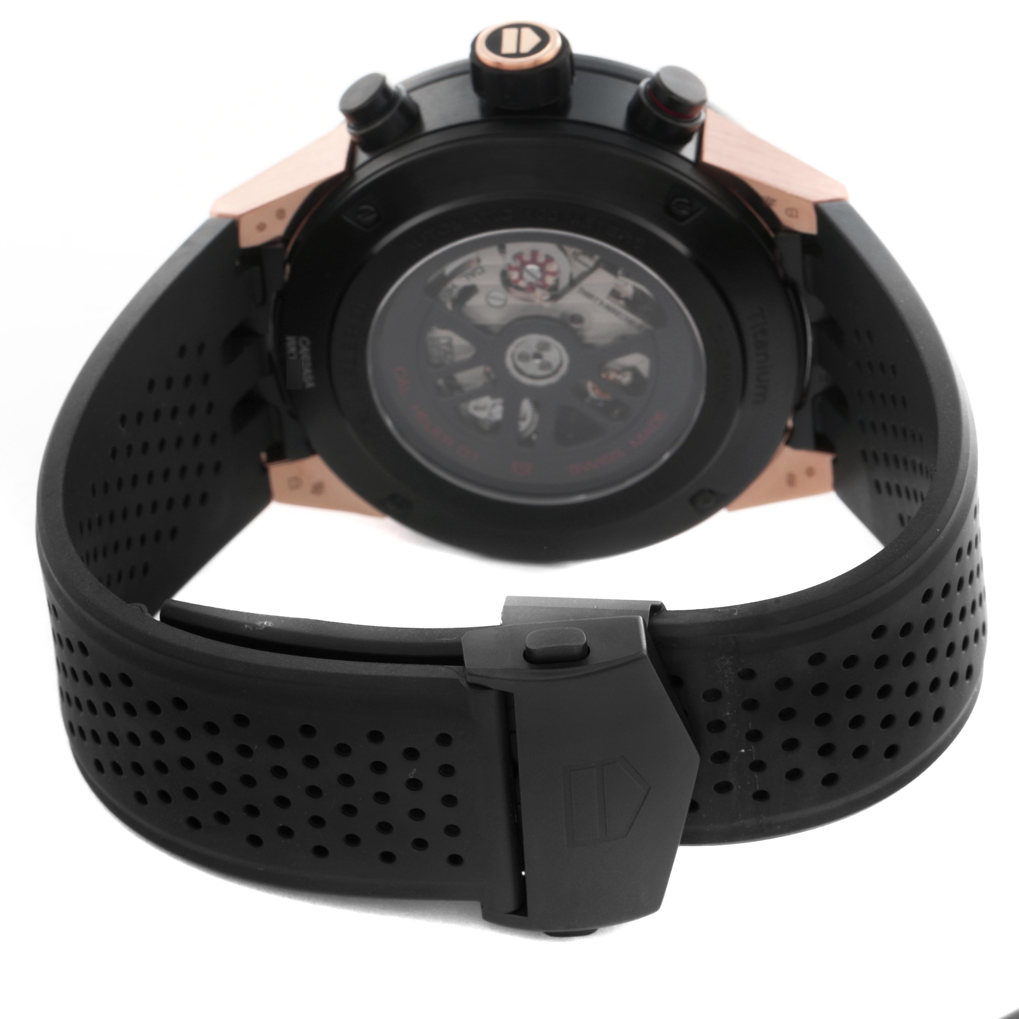 The image shows the back view of a Tag Heuer Carrera CAR2A5A Men's Titanium Black Dial CAR2A5A Men's Titanium Black Dial watch, displaying its transparent case back and the black perforated strap.