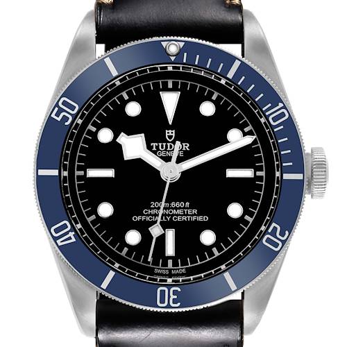 The image shows a front view of the Tudor Heritage Black Bay watch, highlighting its dial, bezel, and leather strap.
