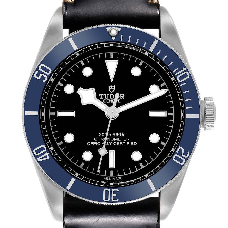 The Tudor Heritage Black Bay watch is shown from the front, highlighting its dial, bezel, crown, and strap.