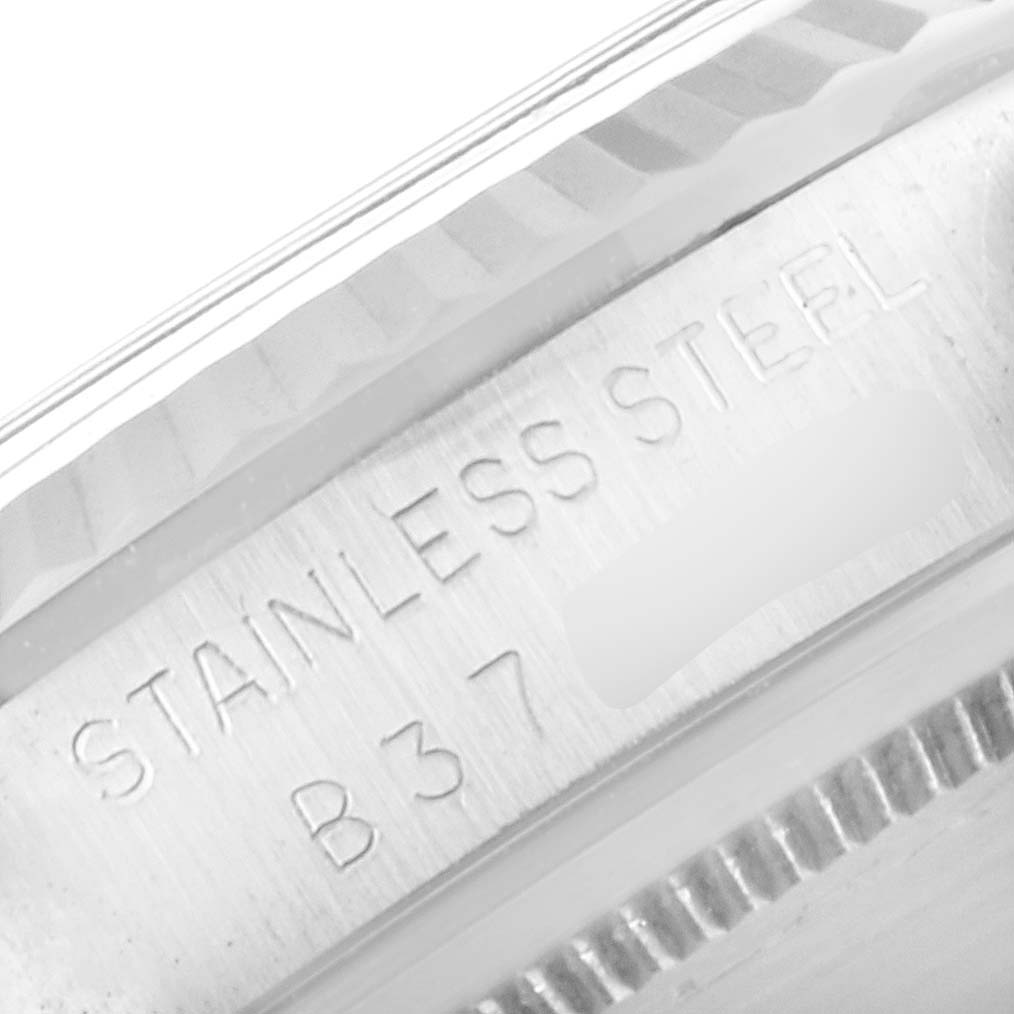 The image shows a close-up of the stainless steel case back of a Tudor Prince 74034 Men's Stainless Steel Silver Dial 74034 Men's Stainless Steel Silver Dial watch, displaying the "STAINLESS STEEL" engraving.