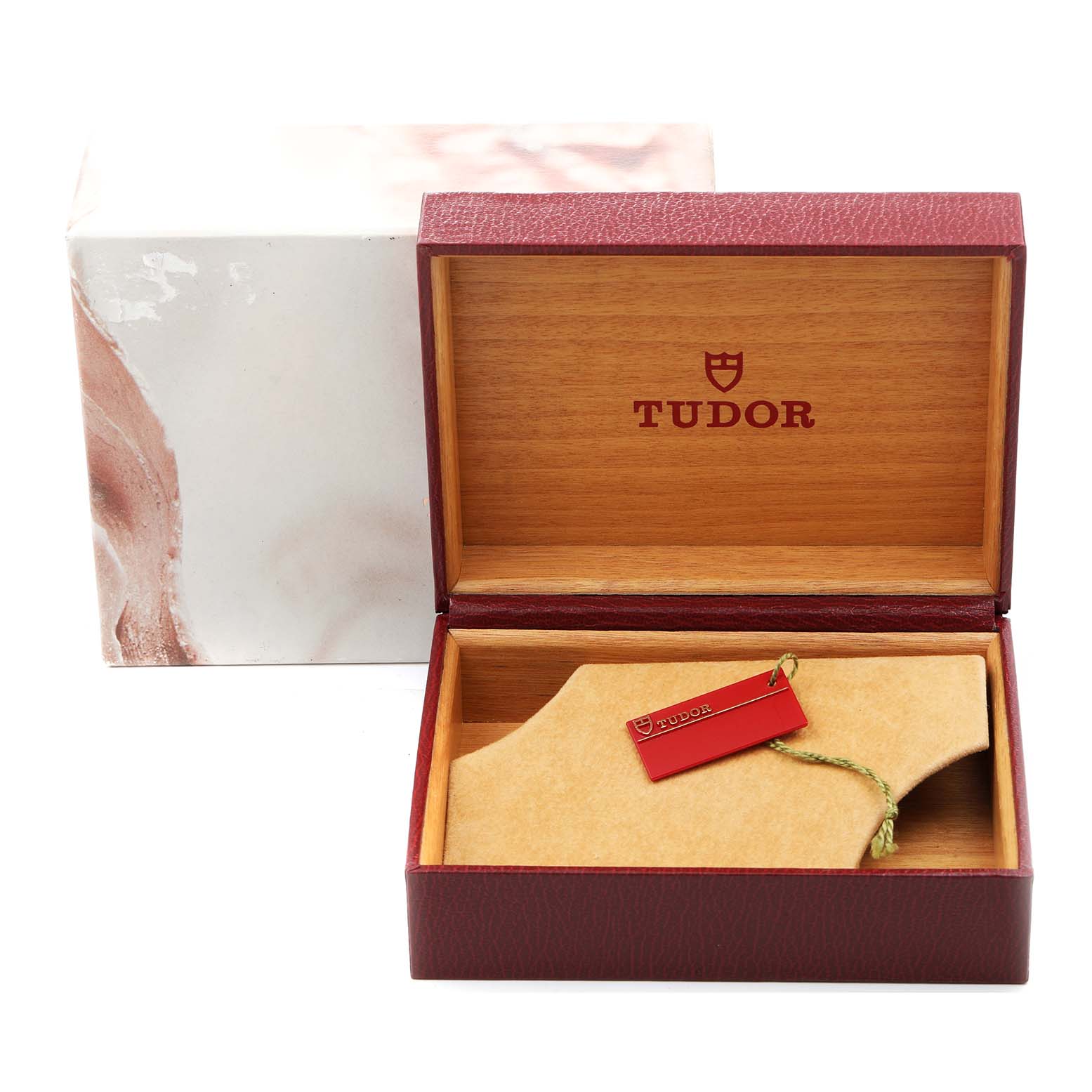 The image shows the open packaging box of the Tudor Prince 74034 Men's Stainless Steel Silver Dial 74034 Men's Stainless Steel Silver Dial model watch, including a cushion and hang tag.