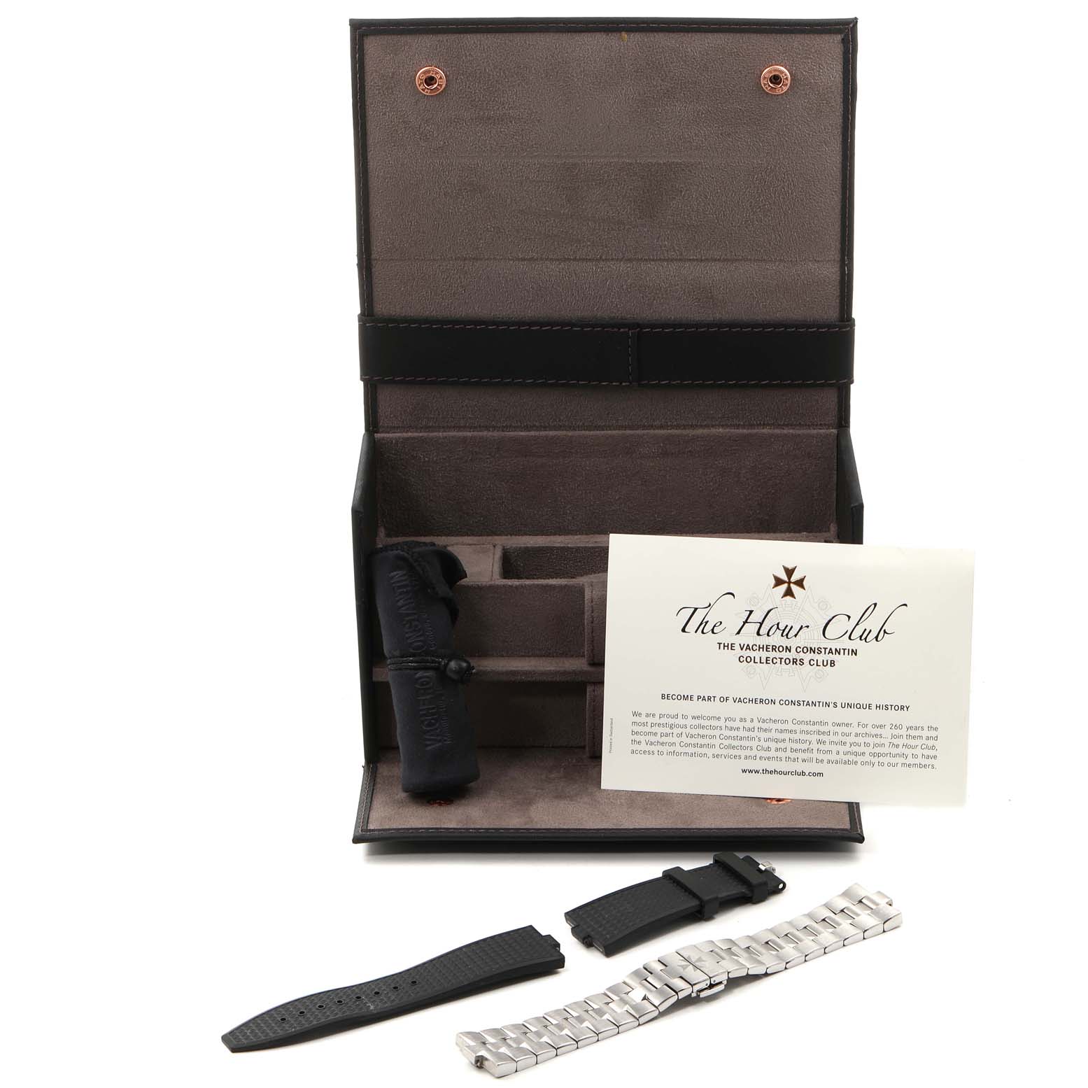 The image shows accessories for the Vacheron Constantin Overseas 7900V/110A-B334 Men's Stainless Steel Blue Dial 7900V/110A-B334 Men's Stainless Steel Blue Dial model, including straps and a bracelet, displayed with a carrying case.