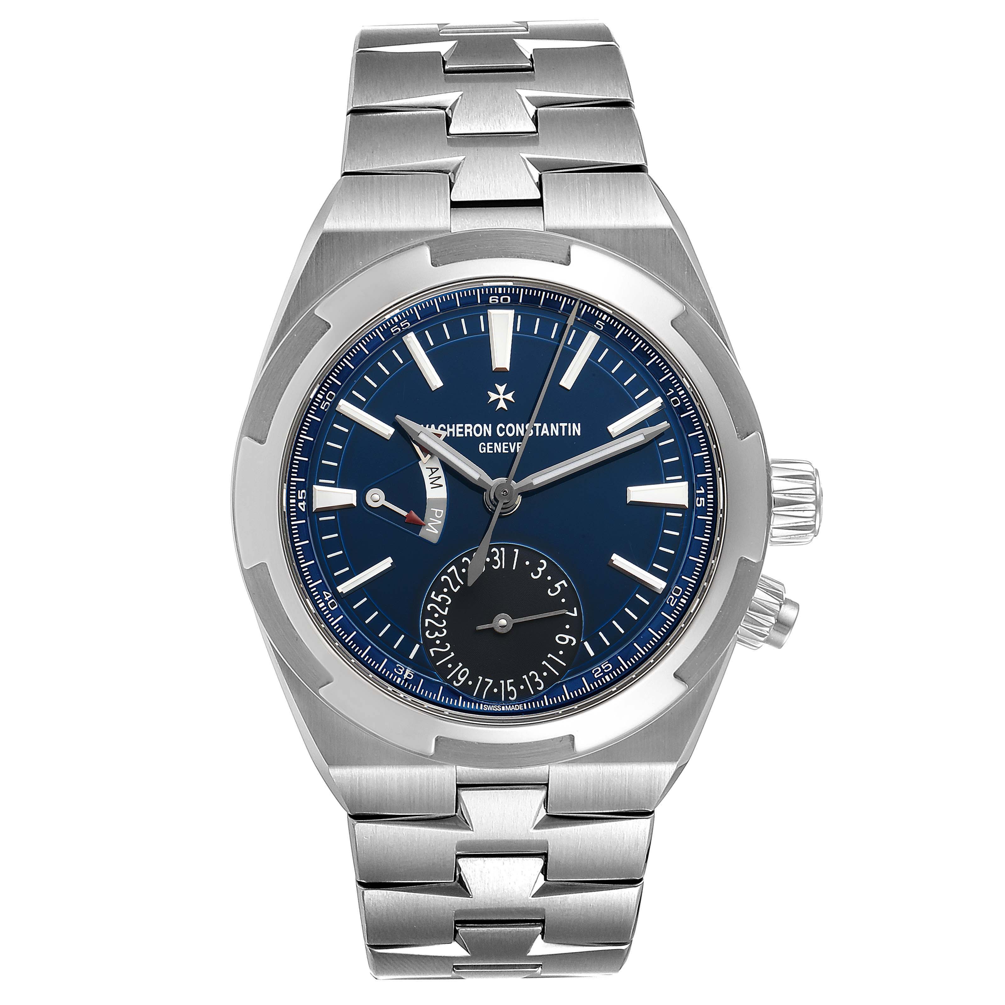 The Vacheron Constantin Overseas 7900V/110A-B334 Men's Stainless Steel Blue Dial 7900V/110A-B334 Men's Stainless Steel Blue Dial watch is shown from the front, displaying its face, dial, hands, and stainless steel bracelet.