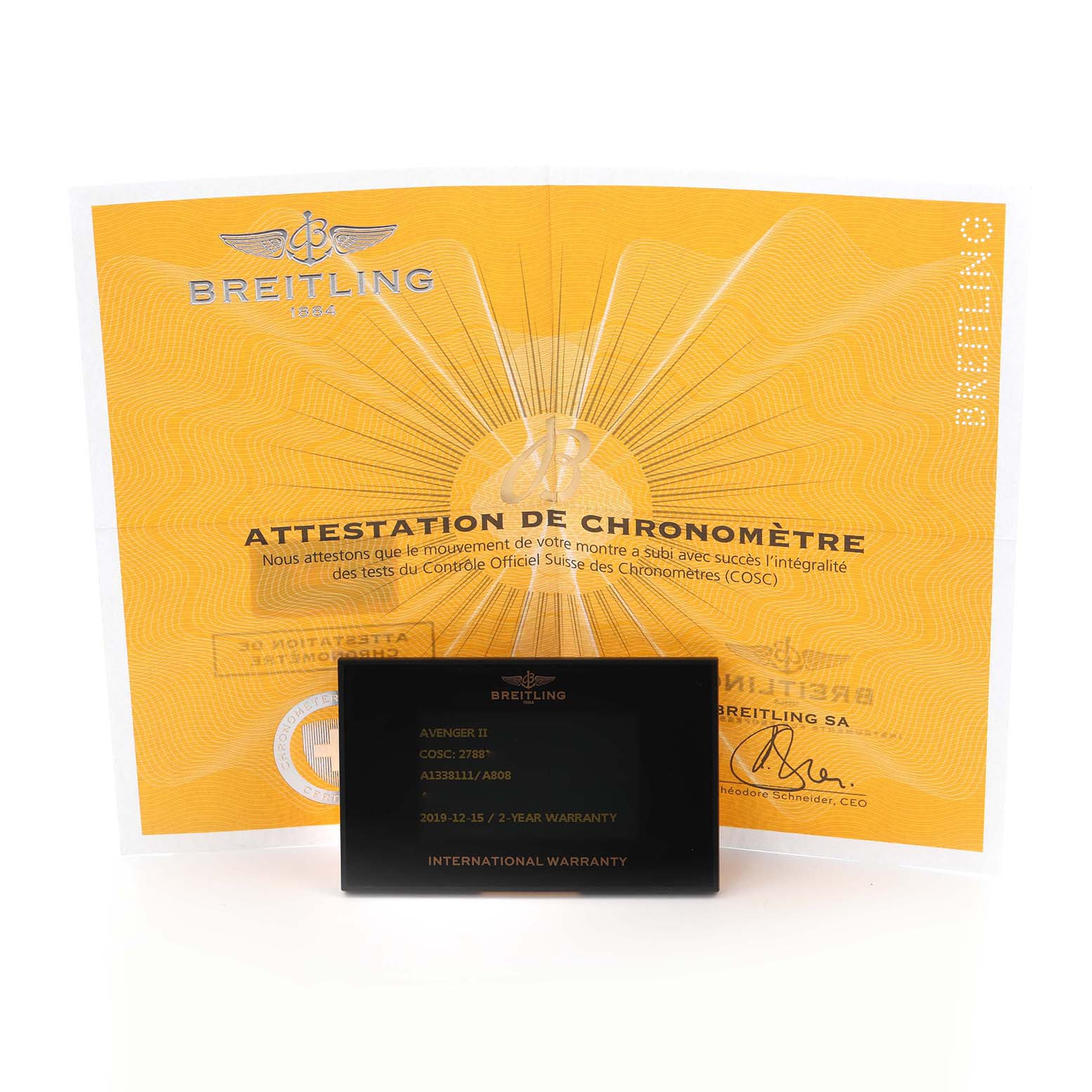 The image shows the warranty card and chronometer certificate for the Breitling Avenger A1338111/A808 Men's Stainless Steel Mother of Pearl Dial A1338111/A808 Men's Stainless Steel Mother of Pearl Dial model.