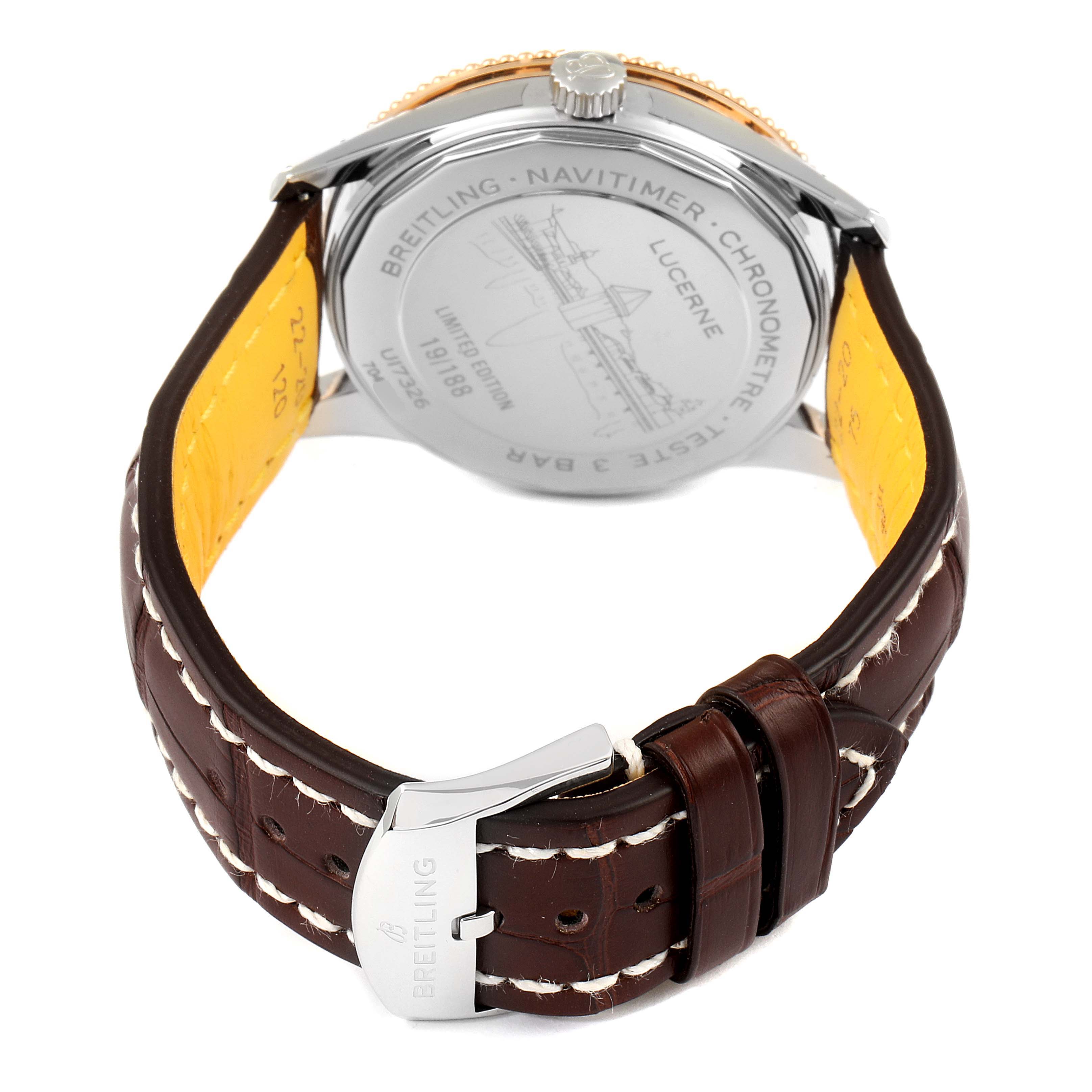 The image shows the back angle of a Breitling Navitimer U17326211M1P1 Men's Stainless Steel Grey Dial U17326211M1P1 Men's Stainless Steel Grey Dial watch, highlighting its case back and leather strap with stitching.