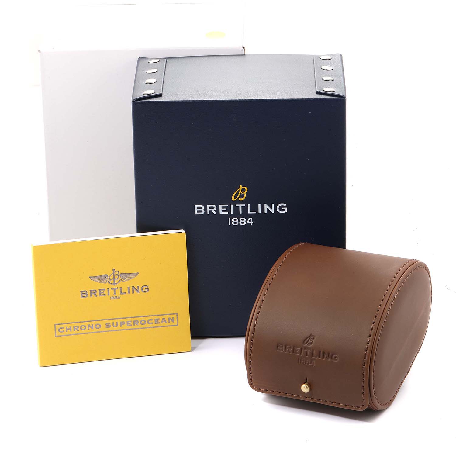 The image shows the Breitling Superocean A13340 Men
s Stainless Steel Beige Dial A13340 Men
s Stainless Steel Beige Dial watch box, instruction booklet, and leather case from a front angle.
