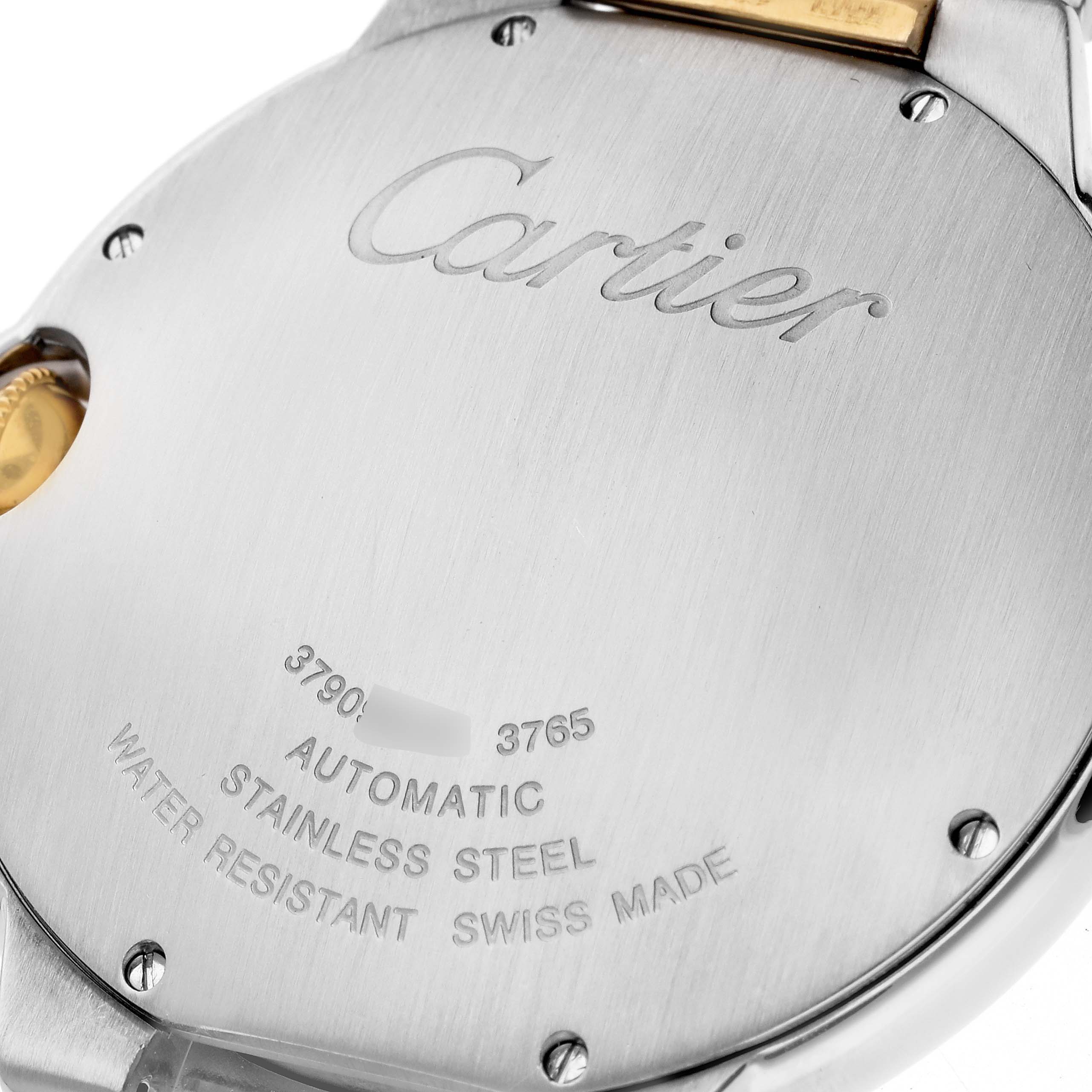 The image shows the back case of the Cartier Ballon Bleu W69009Z3 Men
s Steel and Gold (two tone) Silver Dial W69009Z3 Men
s Steel and Gold (two tone) Silver Dial watch, highlighting its engraved details and material information.