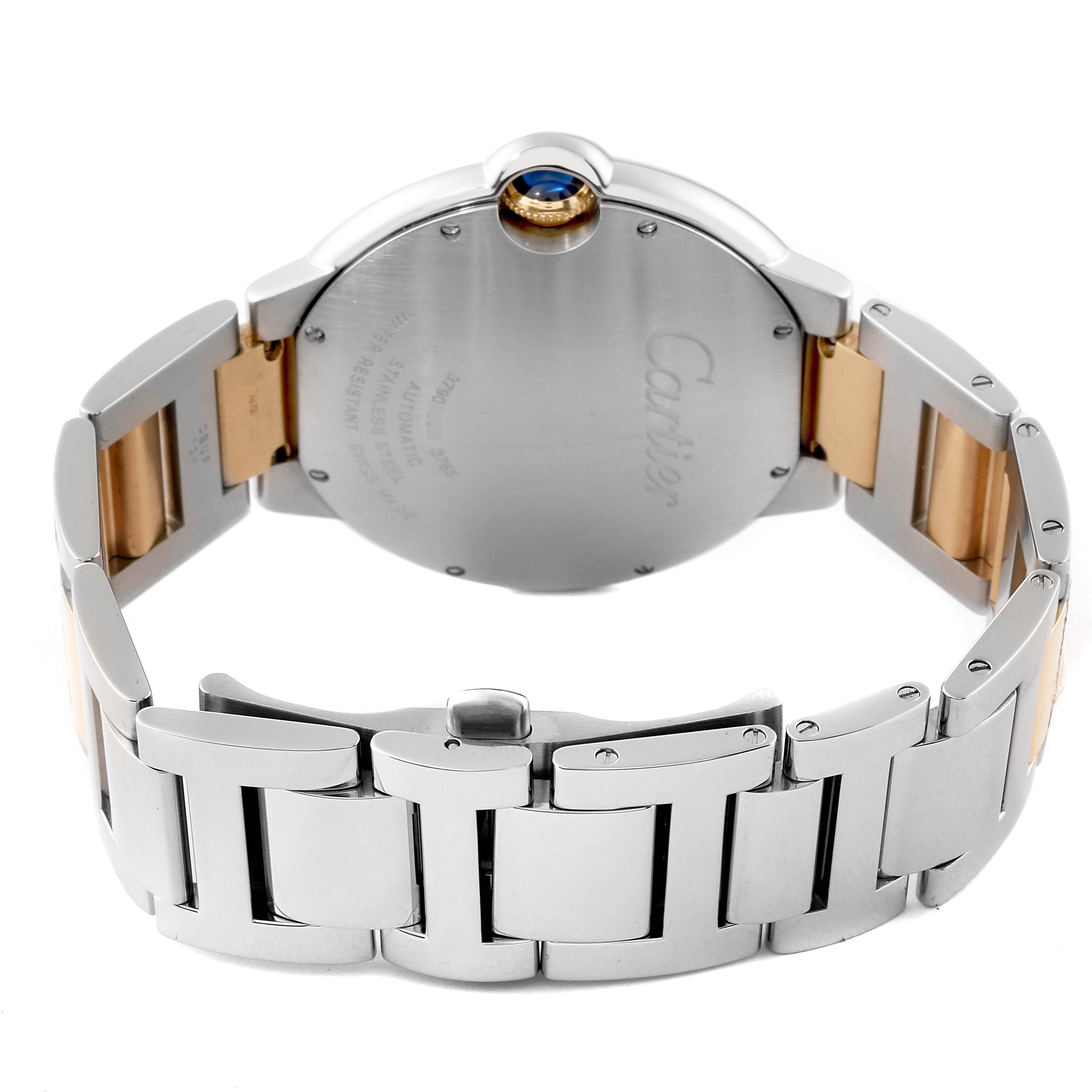 The image shows the back and bracelet of a Cartier Ballon Bleu W69009Z3 Men
s Steel and Gold (two tone) Silver Dial W69009Z3 Men
s Steel and Gold (two tone) Silver Dial watch, featuring a silver and gold-tone design and blue cabochon crown.