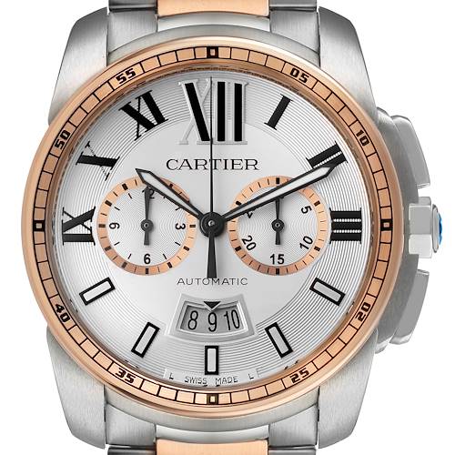 The Calibre de Cartier watch features a close-up view of its face, showcasing its dials, hands, and date display.