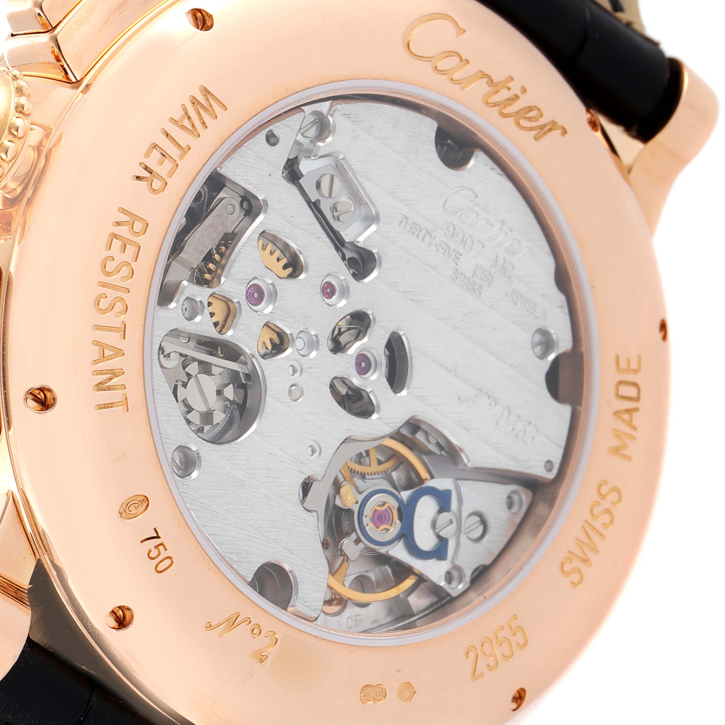 The image shows the back of the Rotonde model by Cartier, highlighting its intricate movement and the engraved details on the case.