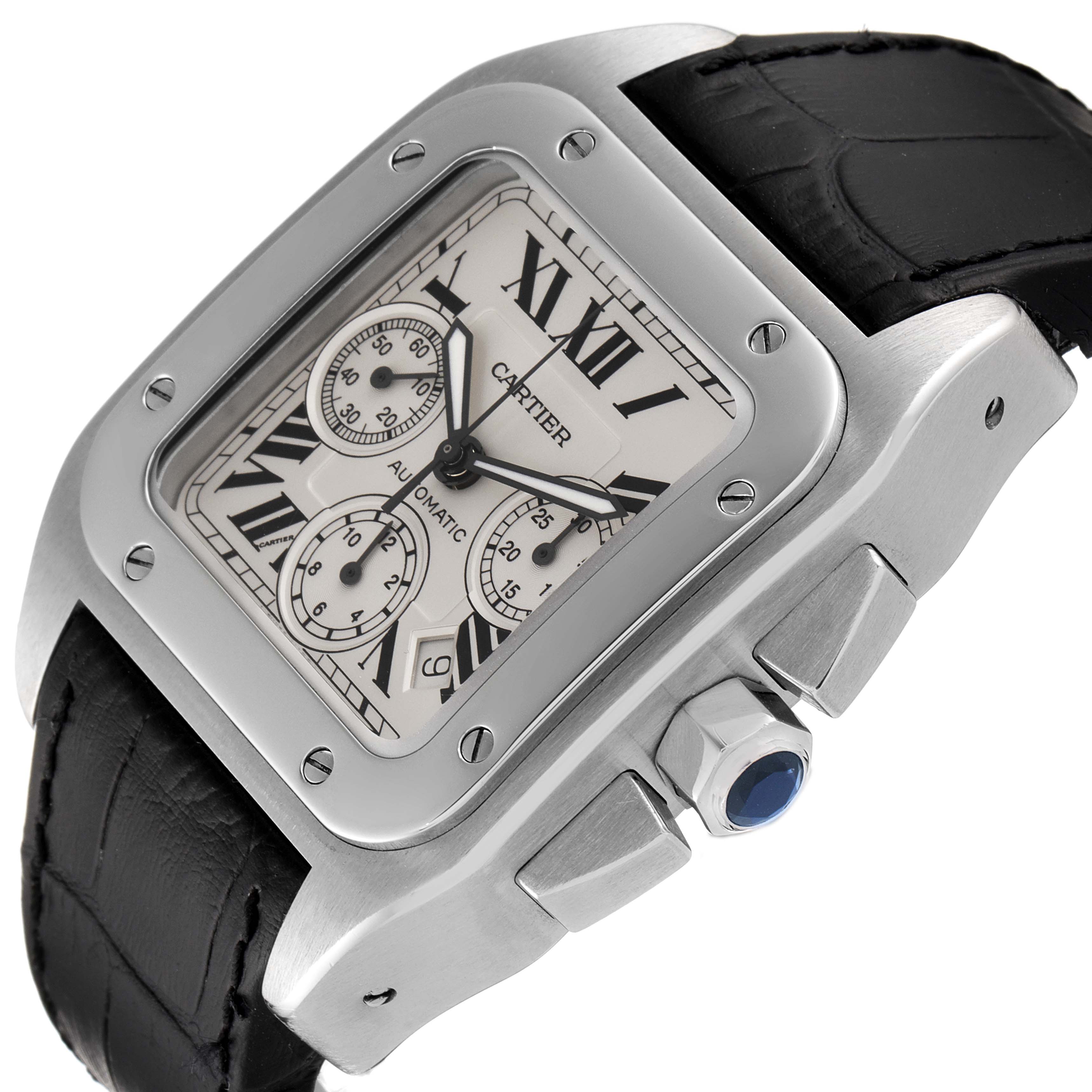 The image shows an angled view of the Cartier Santos W20090X8 Men
s Stainless Steel Silver Dial W20090X8 Men
s Stainless Steel Silver Dial watch, highlighting its face, case, crown, and leather strap.