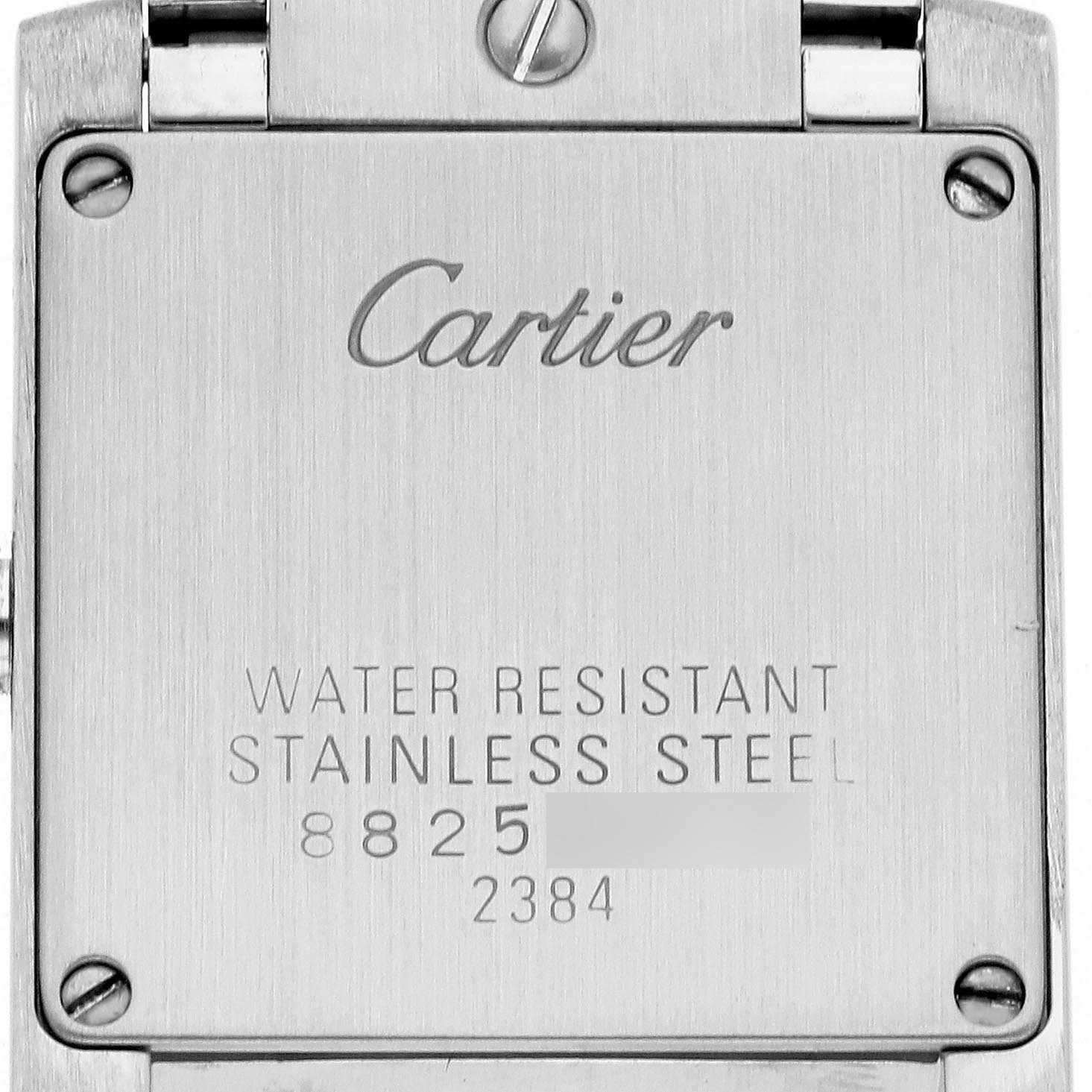The image shows the back case of a Cartier Tank Française watch, highlighting the brand logo, water resistance, material, and model numbers.
