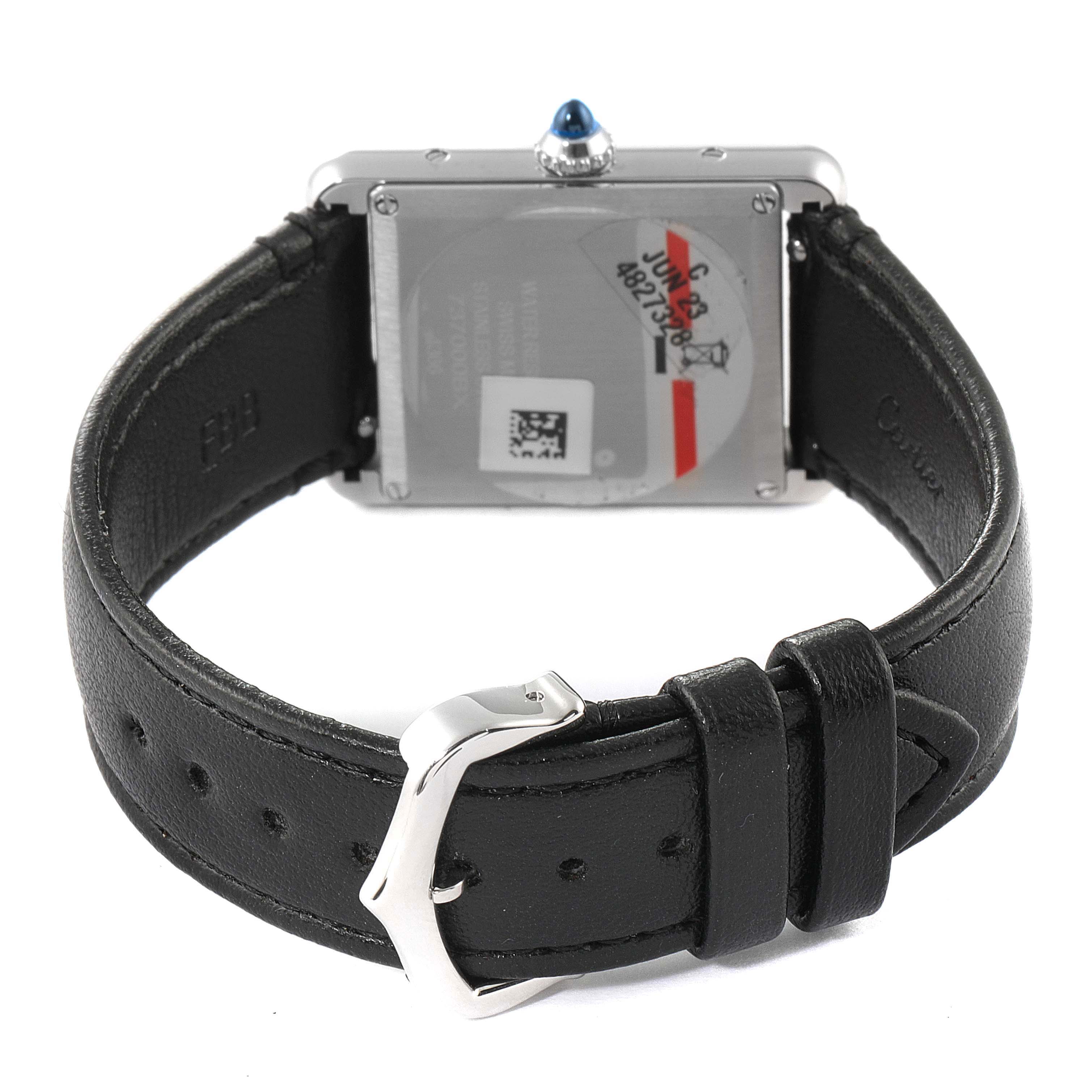This image shows the back and clasp of a Cartier Tank Must WSTA0059 Men's Stainless Steel Silver Dial WSTA0059 Men's Stainless Steel Silver Dial watch, highlighting the caseback and leather strap.