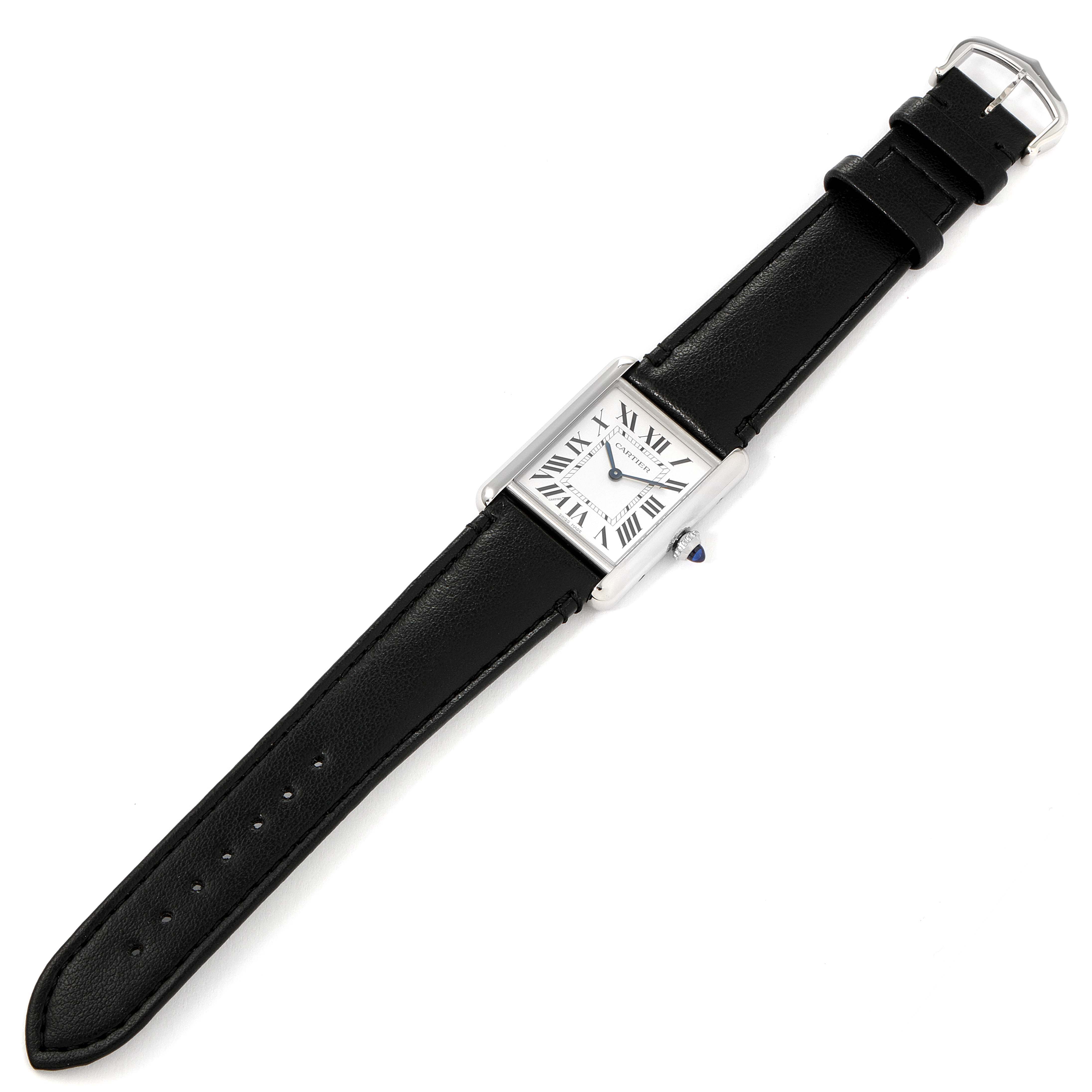 The image shows a top view of a Cartier Tank Must WSTA0059 Men's Stainless Steel Silver Dial WSTA0059 Men's Stainless Steel Silver Dial watch, featuring a black leather strap and rectangular face with Roman numerals.